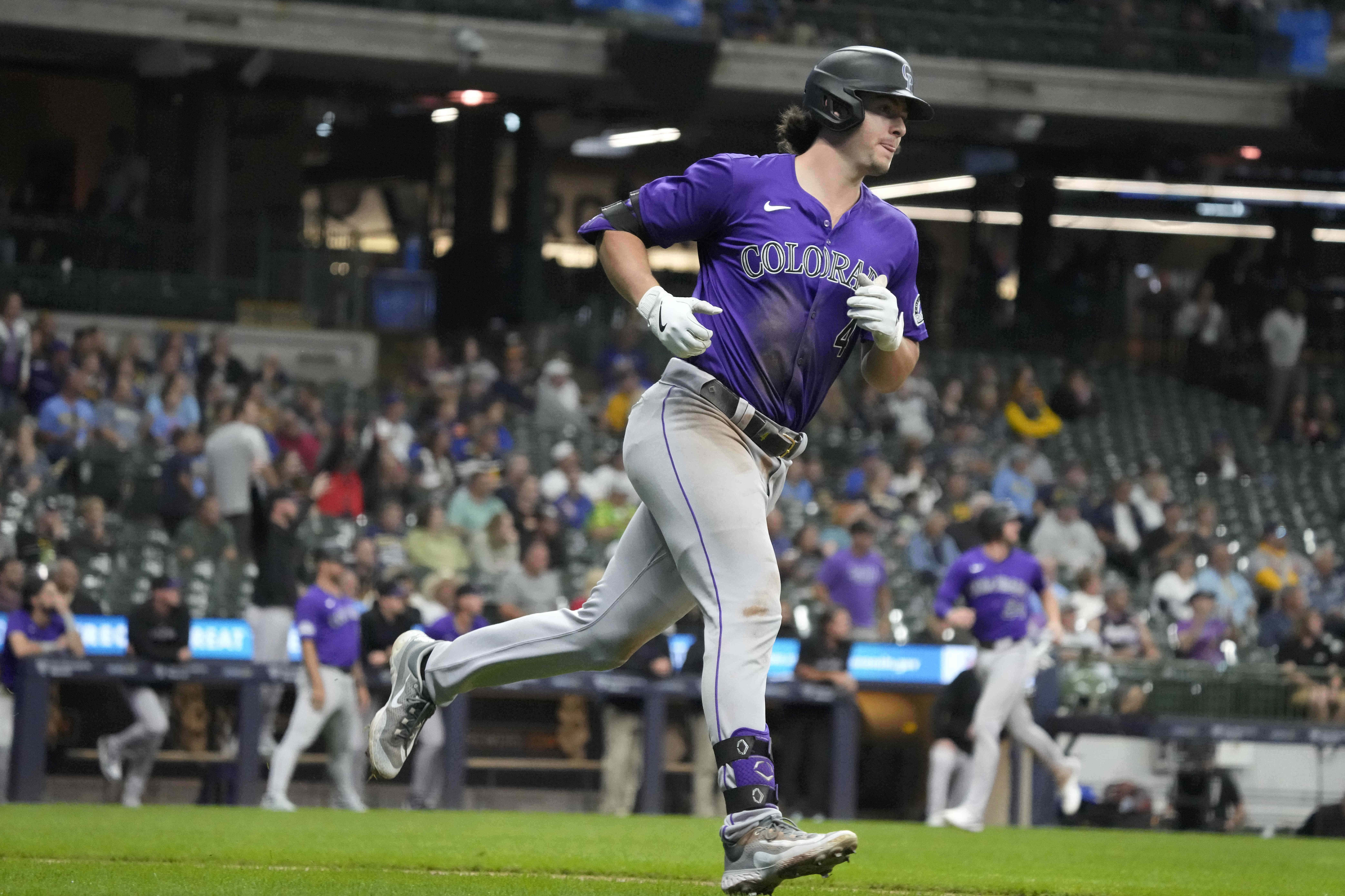 Colorado Rockies' Michael Toglia rounds the bases after hitting a three-run home run during the sixth inning of a baseball game against the Milwaukee Brewers, Friday, Sept. 6, 2024, in Milwaukee. 