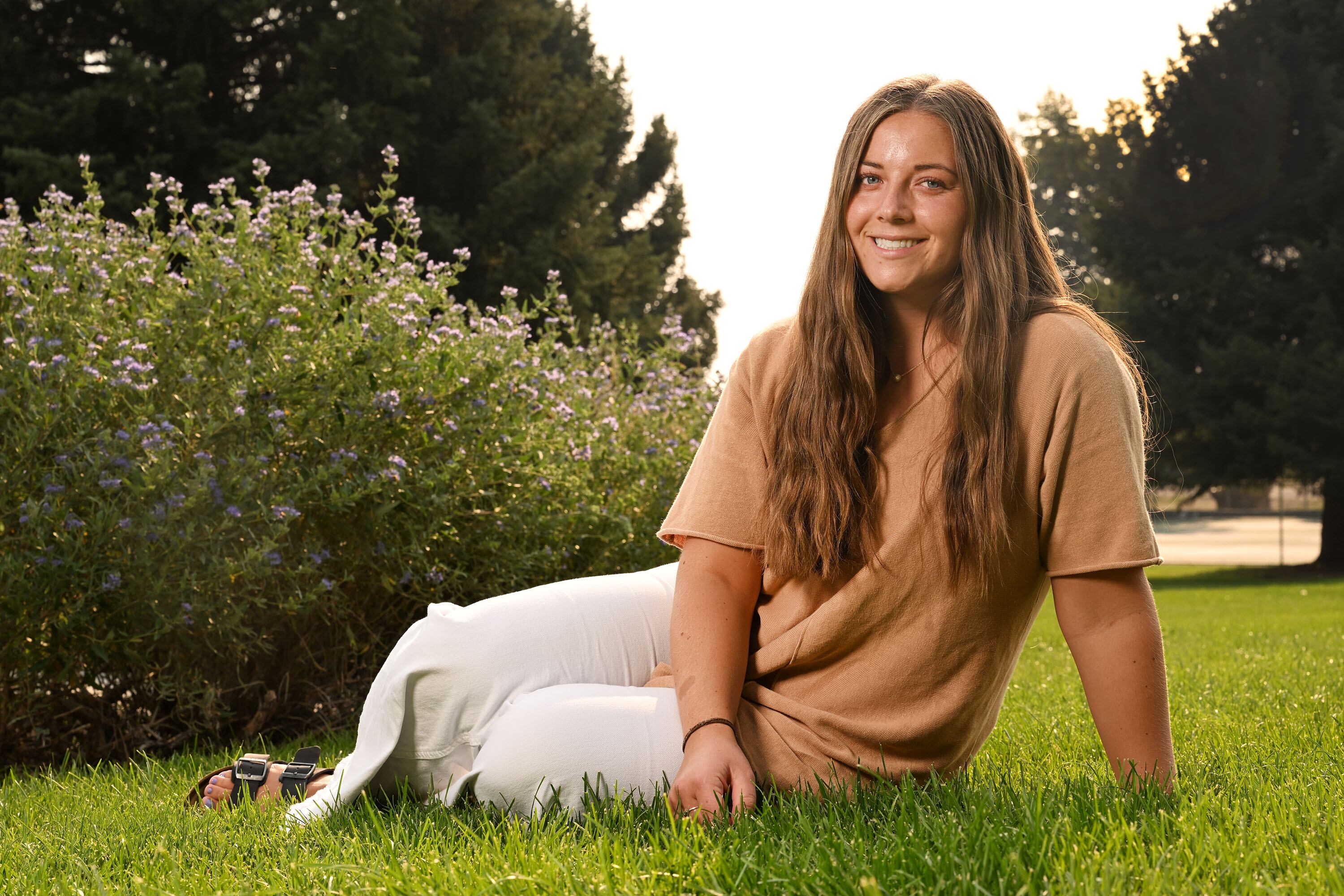 BYU student Camryn Fillmore poses for photos in Provo on Sept. 4.