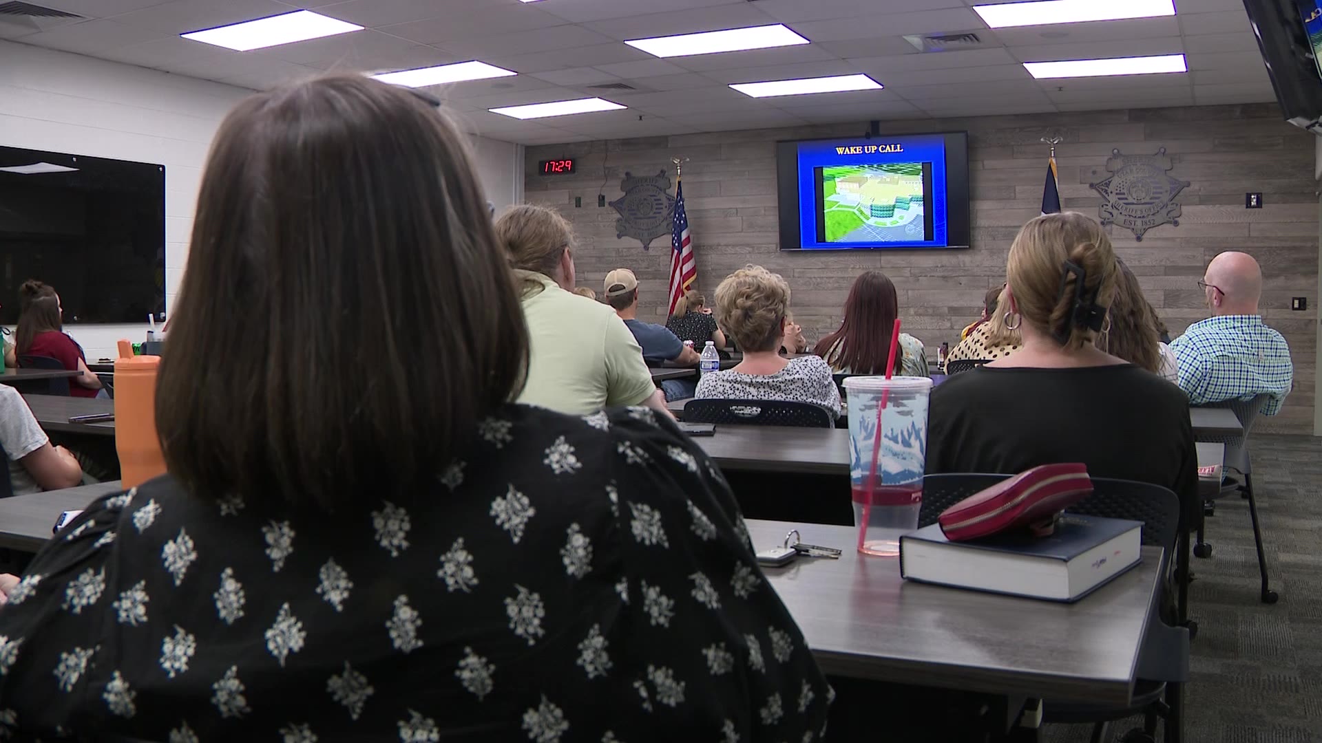 Smith showing a presentation to the educators.