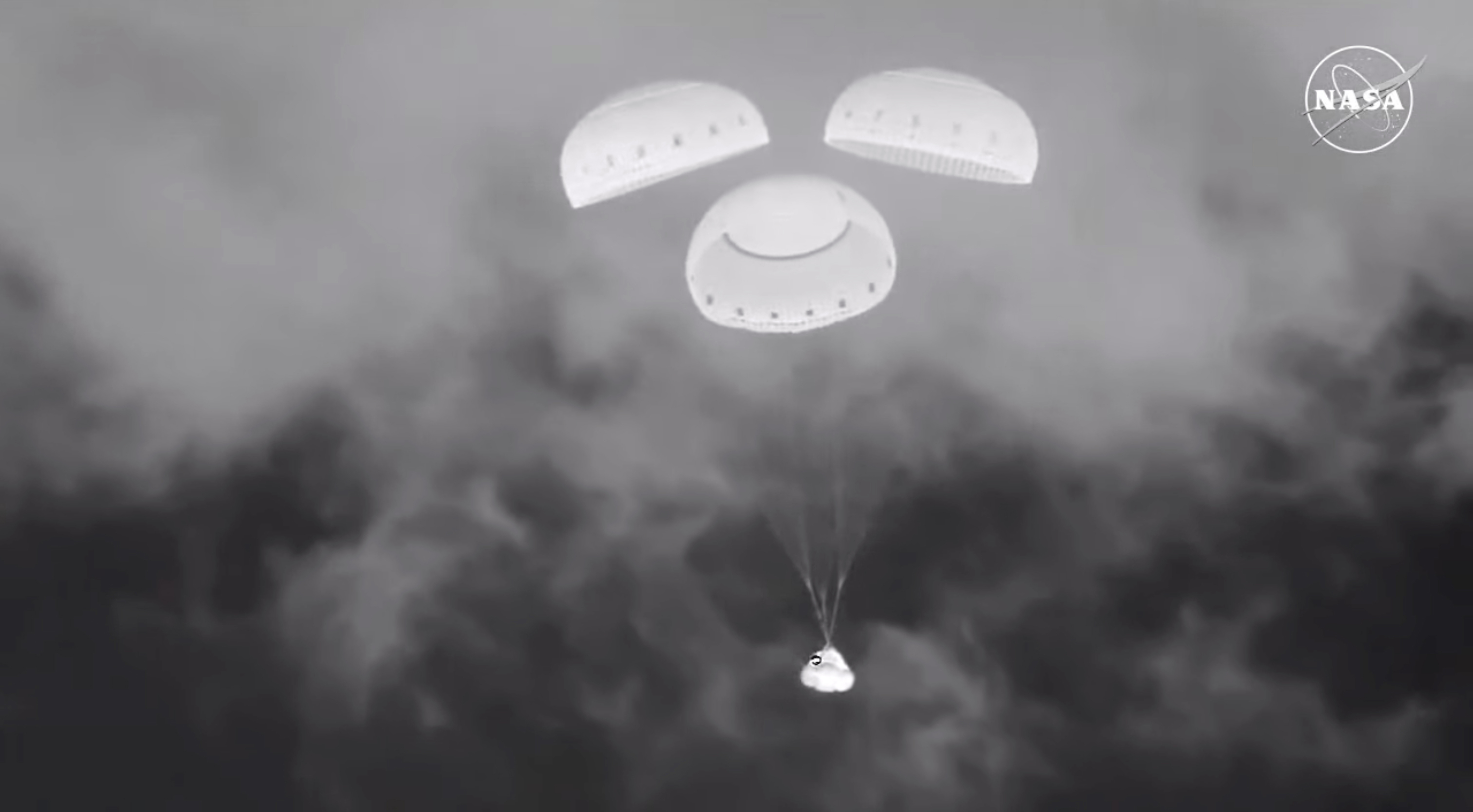 The empty Boeing Starliner capsule floats down toward White Sands Missile Range in New Mexico late Friday after undocking from the International Space Station.