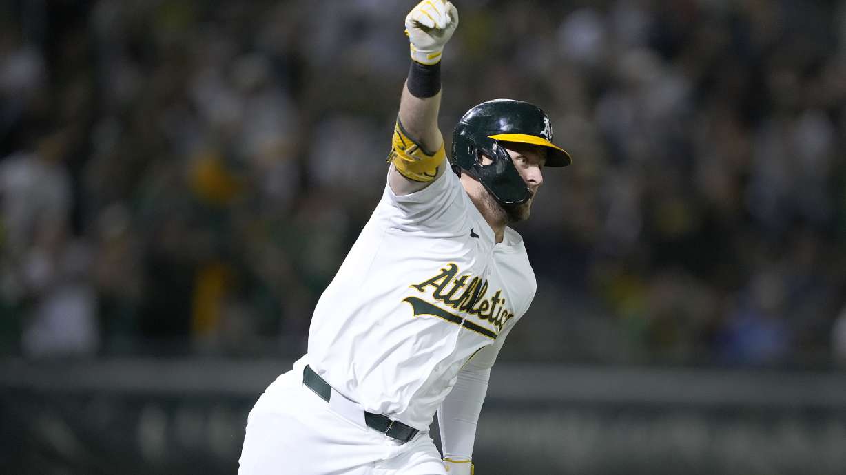 Oakland Athletics' Seth Brown (15) celebrates his game-winning single against the Detroit Tigers during the 13th inning of a baseball game Friday, Sept. 6, 2024, in Oakland, Calif. Oakland won 7-6.