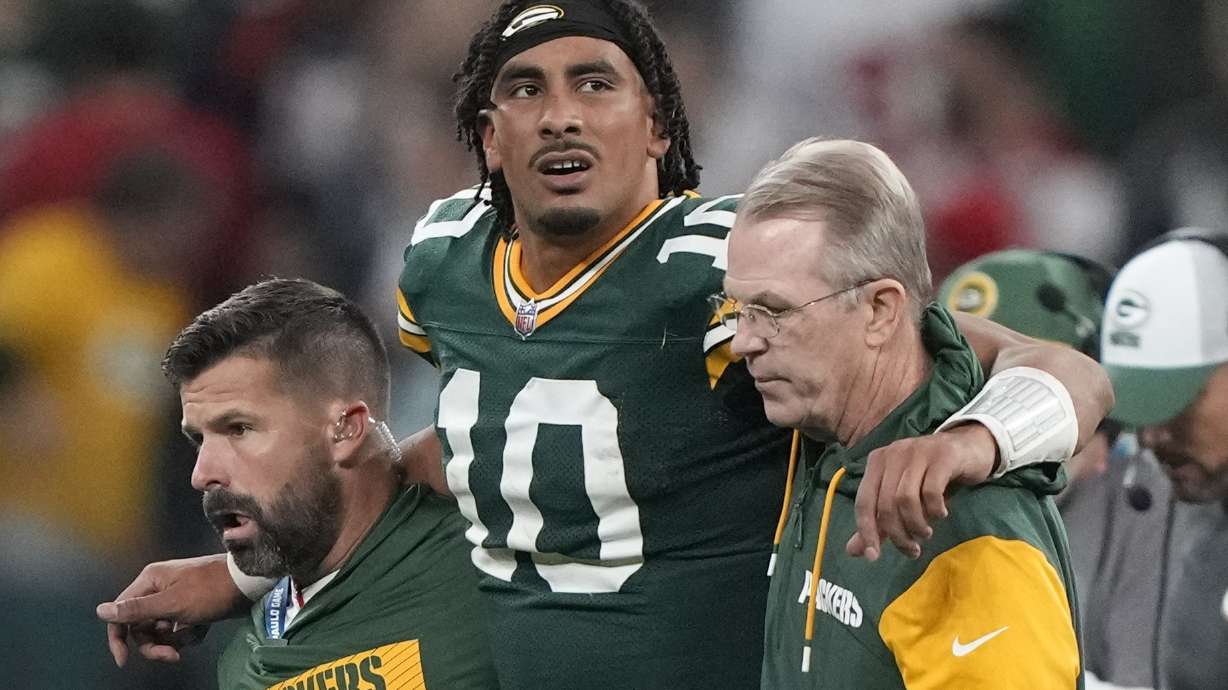 Green Bay Packers quarterback Jordan Love (10) in helped off the field after getting hurt during the second half of an NFL football game against the Philadelphia Eagles, Saturday, Sept. 7, 2024, at the Neo Quimica Arena in Sao Paulo.