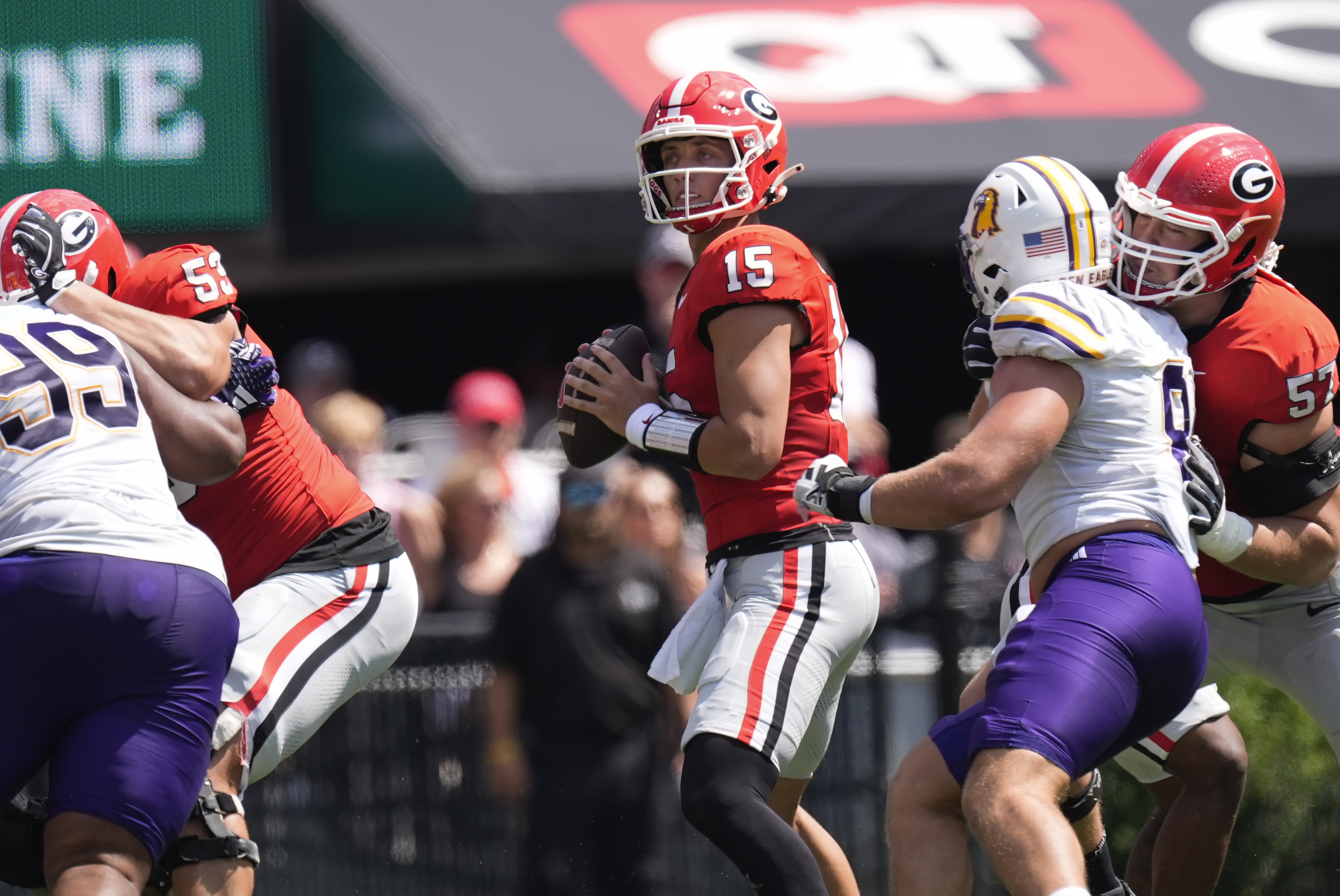 Georgia quarterback Carson Beck (15) looks for an open reciever during the first half of an NCAA college football game against Tennessee Tech Saturday, Sept. 7, 2024, in Athens, ga.