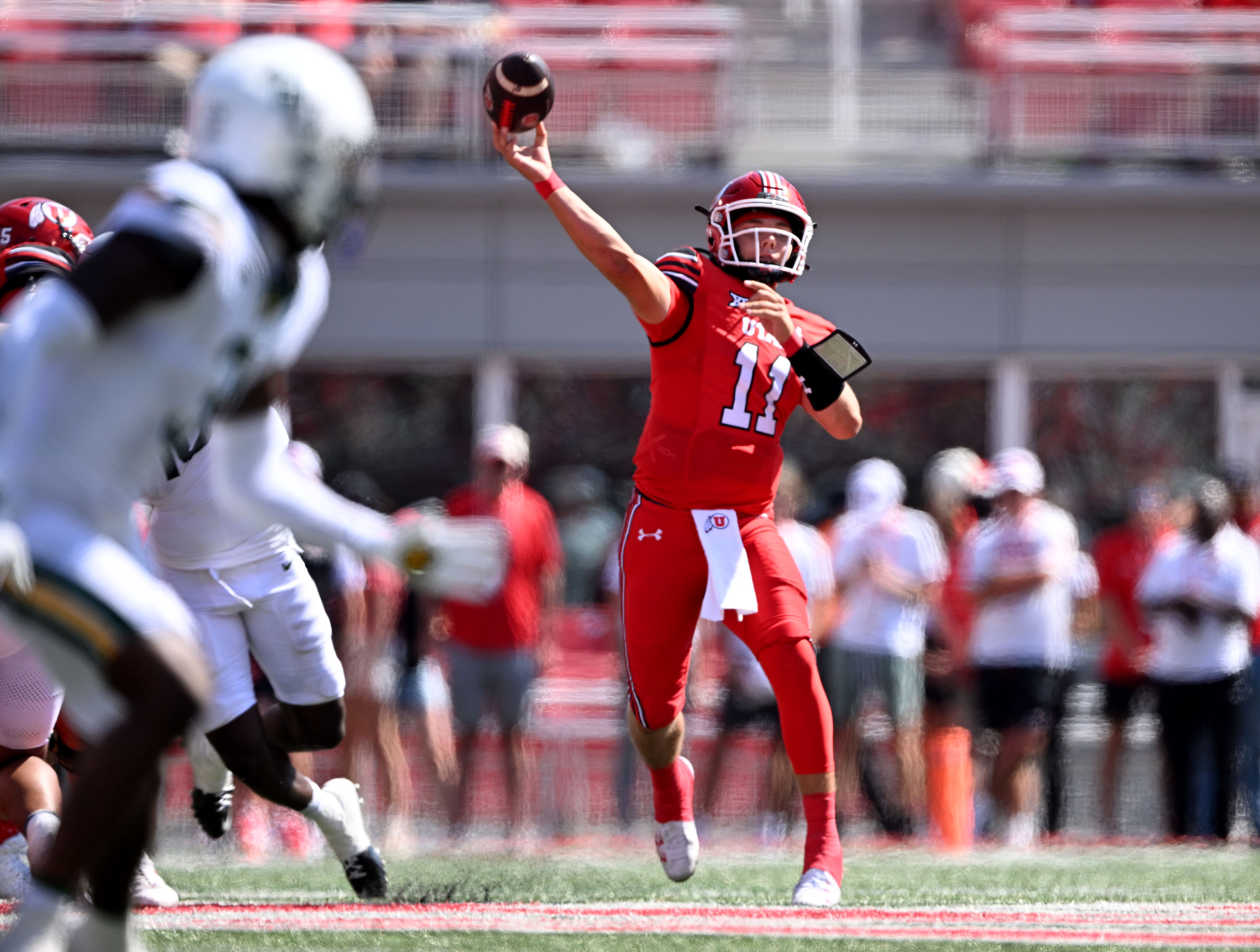 Utah Utes quarterback Isaac Wilson (11) passes the ball as Utah and Baylor play at Rice-Eccles Stadium in Salt Lake City, Friday, Sept. 7, 2024.