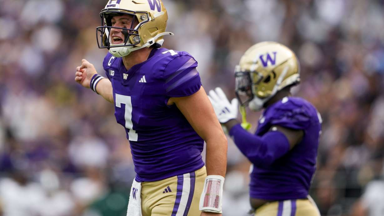 Washington quarterback Will Rogers (7) reacts during the first half of an NCAA college football game against Eastern Michigan, Saturday, Sept. 7, 2024, in Seattle.