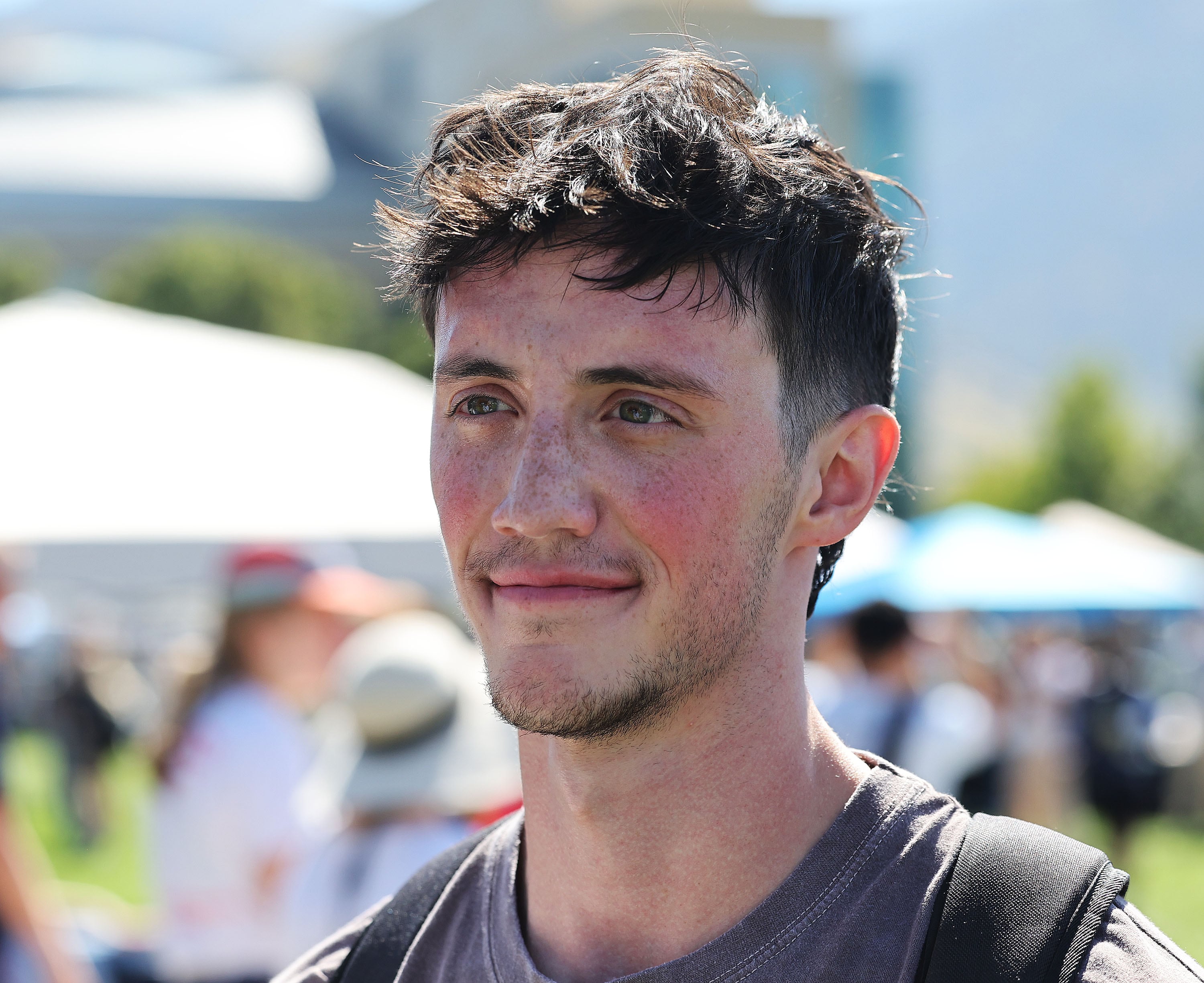 USU student Jace Dart talks about the upcoming election at the "Day on the Quad — Voter Registration" event in Logan on Wednesday, Aug. 28.