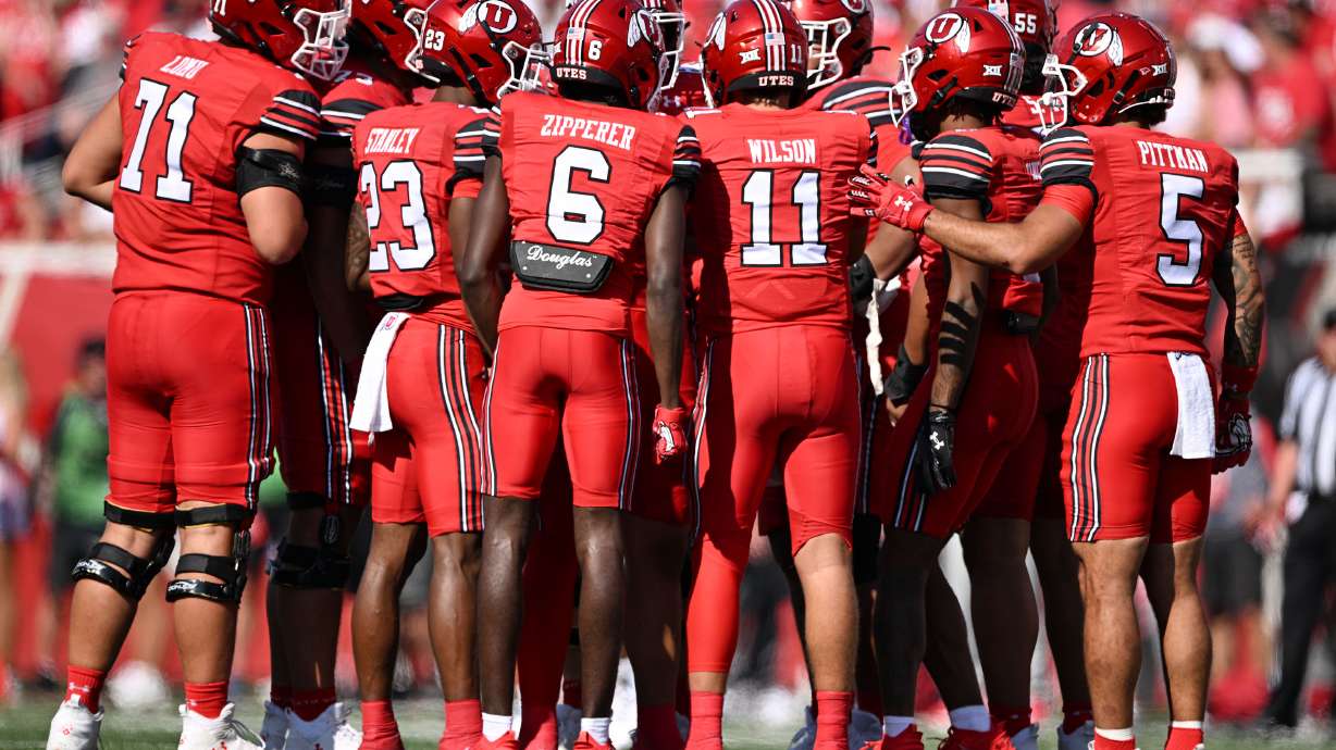 Utah Utes quarterback Isaac Wilson (11) calls the play in the huddle as Utah and Baylor play at Rice-Eccles Stadium in Salt Lake City on Saturday, Sept. 7, 2024. Utah won 23-12.