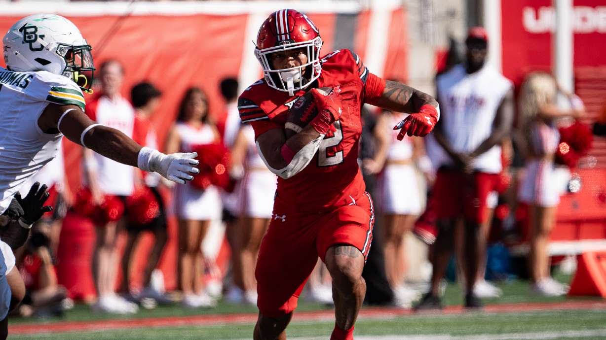 Utah running back Micah Bernard attempts to avoid a tackle during a game against Baylor on Sept. 7, 2024.