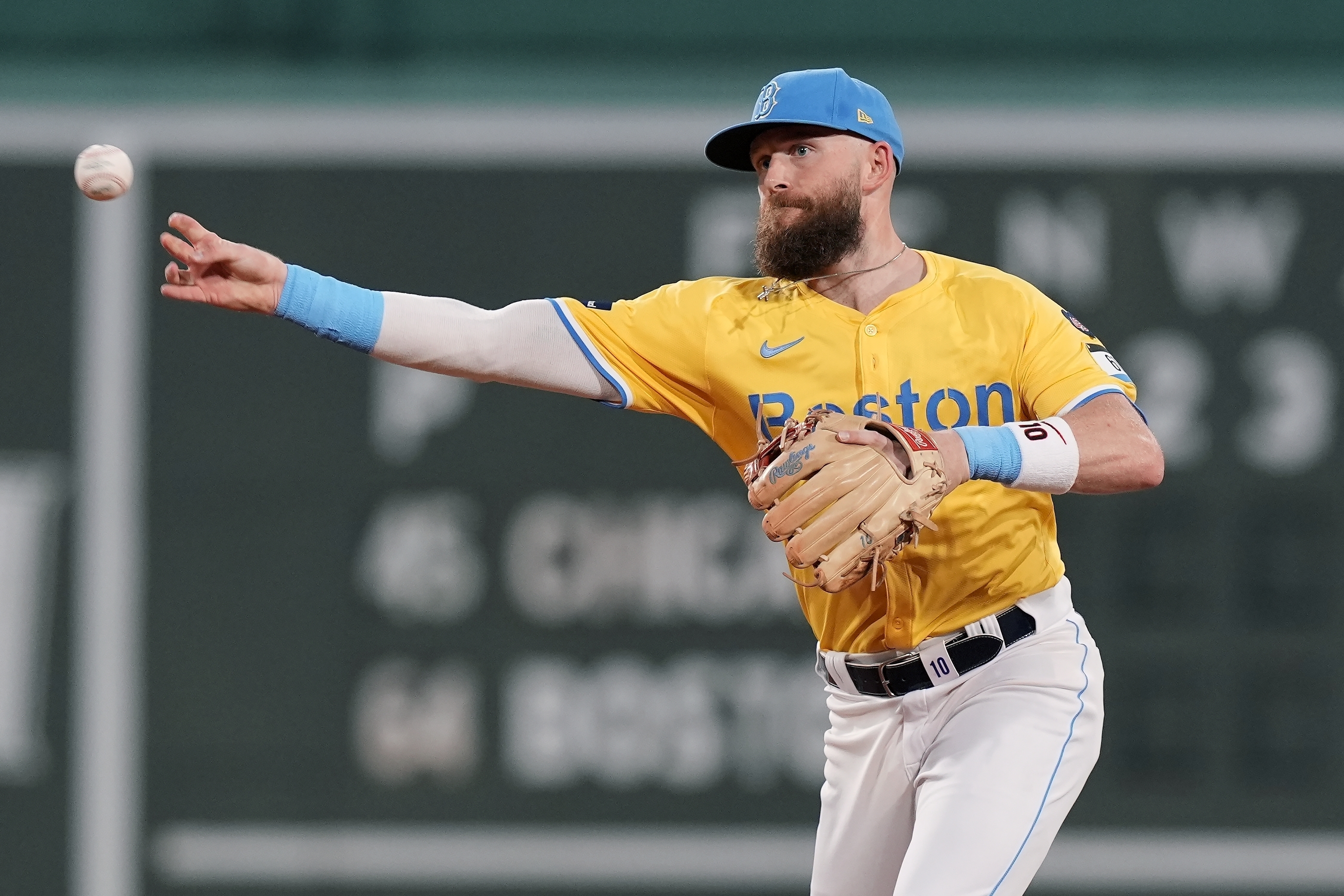 Boston Red Sox shortstop Trevor Story throws to first base on the ground out by Chicago White Sox's Nicky Lopez during the first inning of a baseball game, Saturday, Sept. 7, 2024, in Boston.