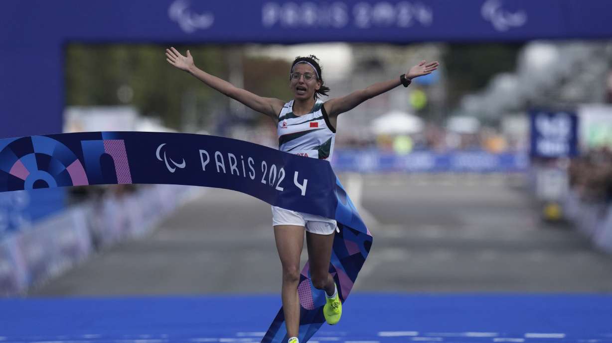 Morocco's Fatima Ezzahra El Idrissi wins the women's marathon T12 at the 2024 Paralympics, Sunday, Sept. 8, 2024, in Paris, France.