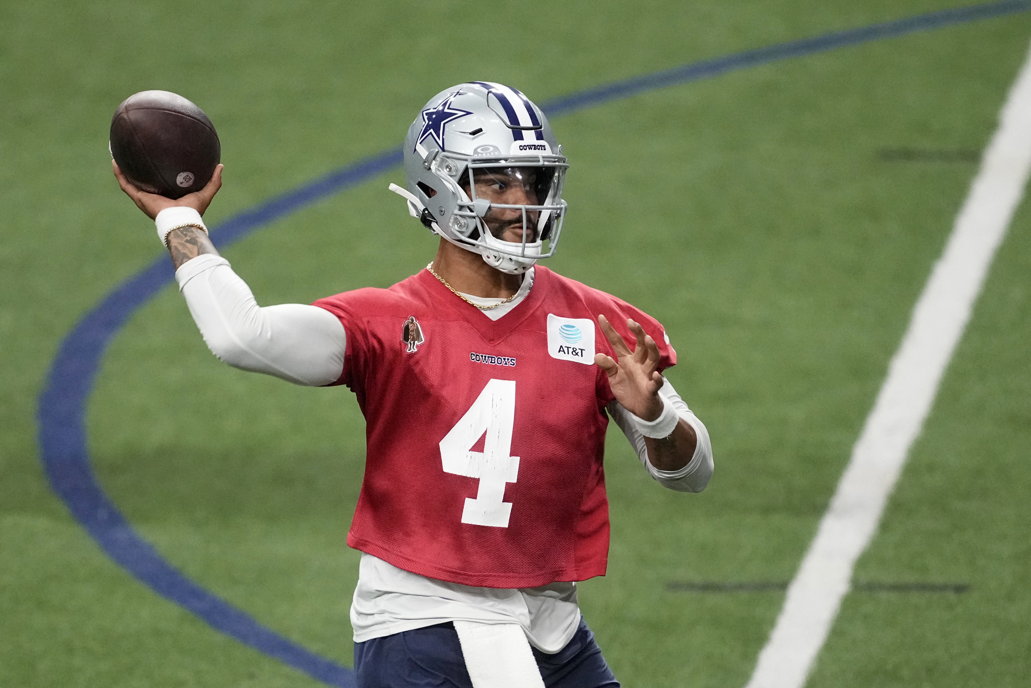 Dallas Cowboys quarterback Dak Prescott (4) throws a pass during an NFL football practice at the team's training facility, Wednesday, Aug. 28, 2024, in Frisco, Texas.