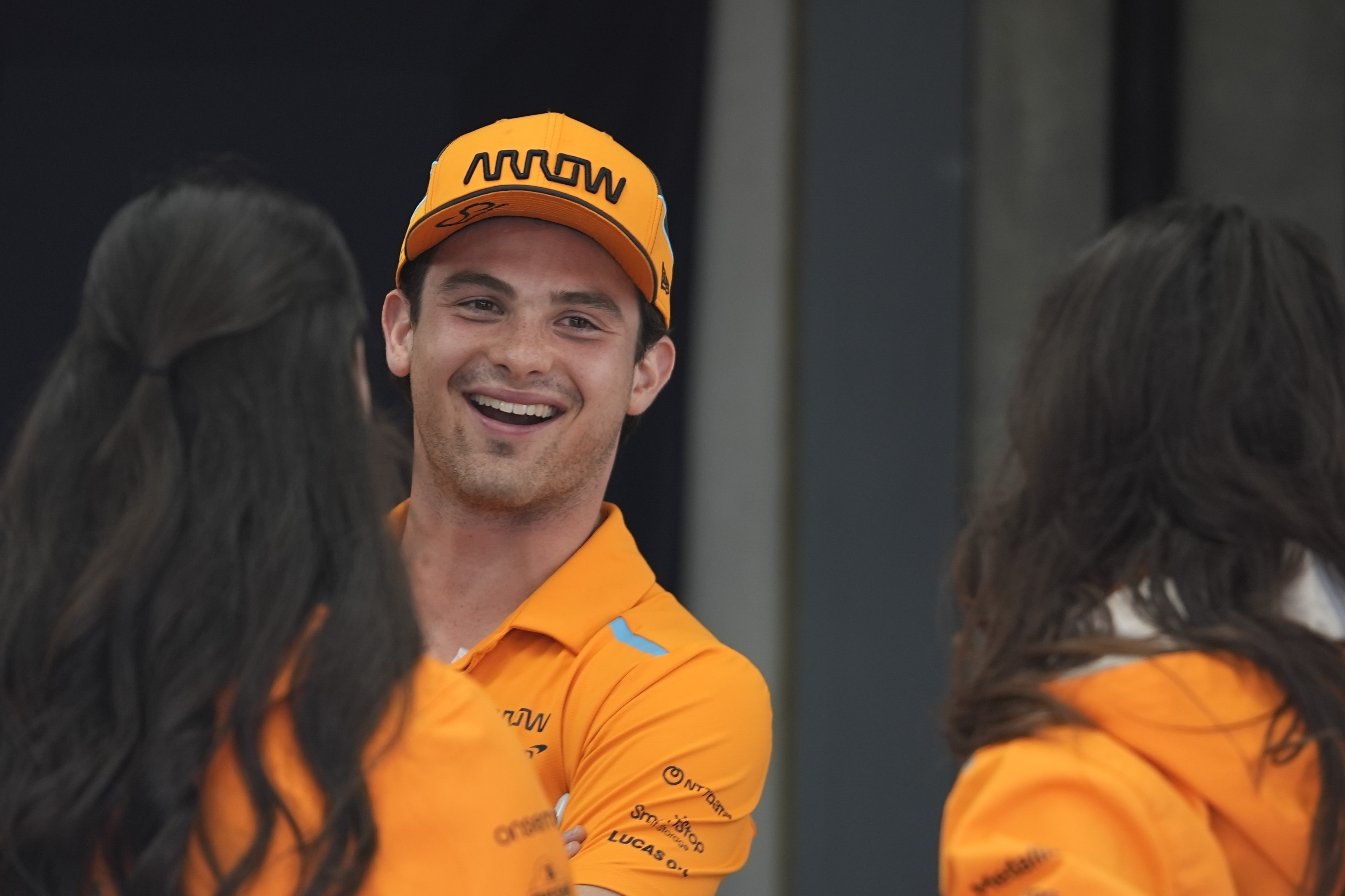 FILE - Pato O'Ward, of Mexico, talks with staff members before the Indianapolis 500 auto race at Indianapolis Motor Speedway, Sunday, May 26, 2024, in Indianapolis.