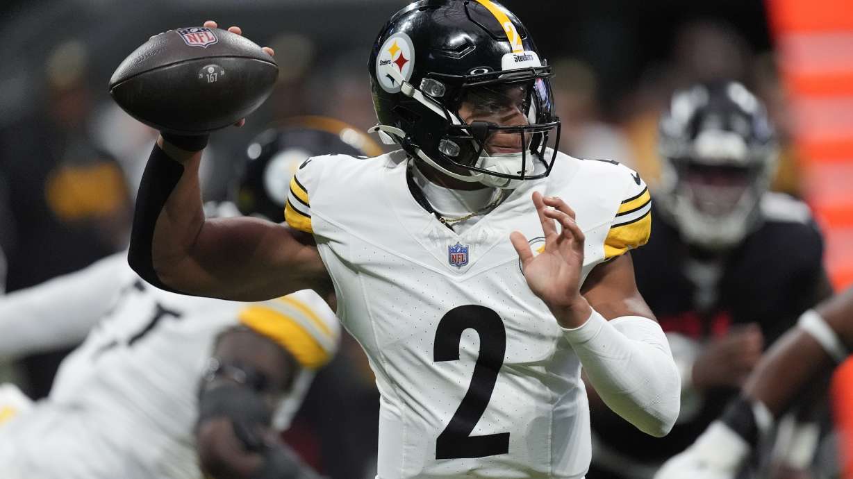 Pittsburgh Steelers quarterback Justin Fields looks to pass during the first half of an NFL football game against the Atlanta Falcons on Sunday, Sept. 8, 2024, in Atlanta.