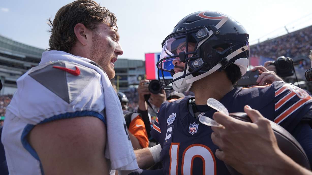 Tennessee Titans quarterback Will Levis and Chicago Bears quarterback Caleb Williams talk after the Bears' 24-17 win over the Titans in an NFL football game Sunday, Sept. 8, 2024, in Chicago.