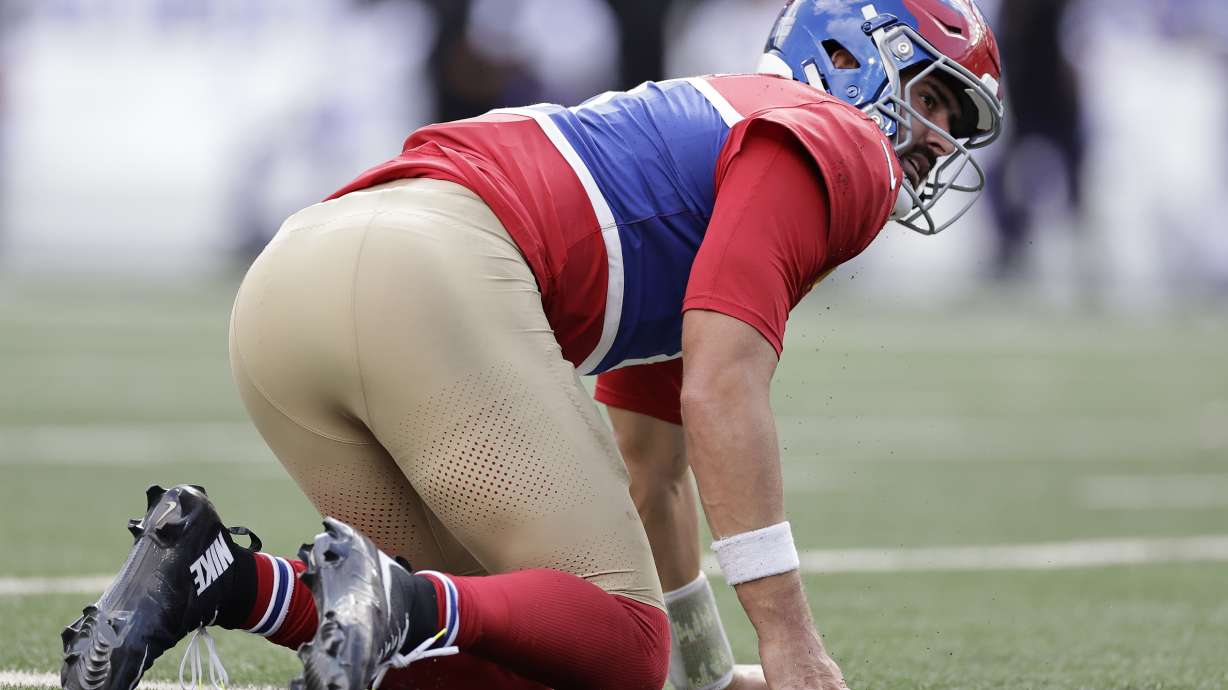 New York Giants quarterback Daniel Jones (8) looks on after being tackled during the second half of an NFL football game against the Minnesota Vikings, Sunday, Sept. 8, 2024, in East Rutherford, N.J.
