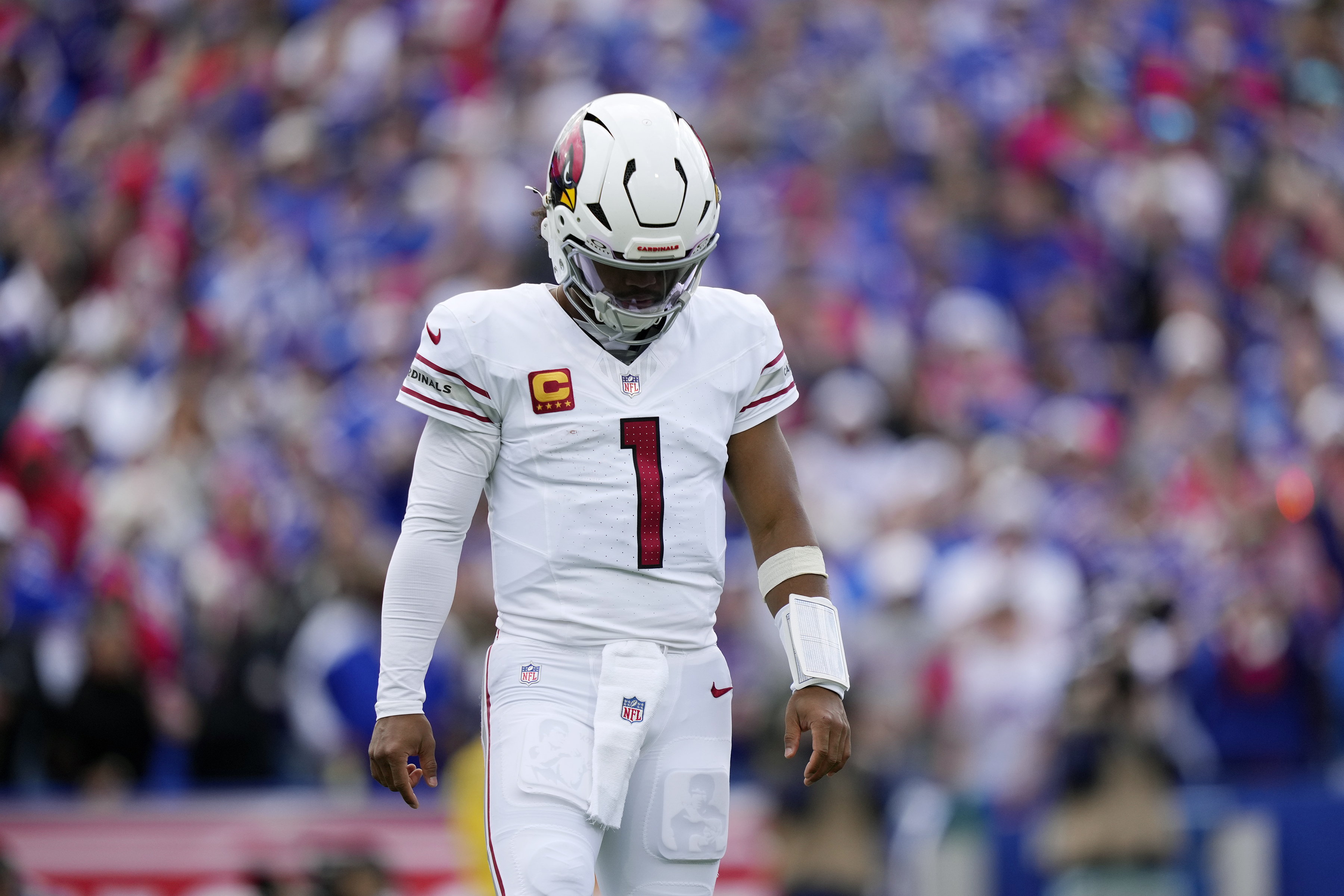 Arizona Cardinals quarterback Kyler Murray walks off the field after a defensive stop by the Buffalo Bills during the second half of an NFL football game Sunday, Sept. 8, 2024, in Orchard Park, N.Y.
