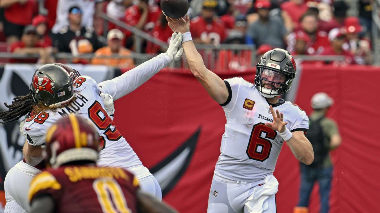 Tampa Bay Buccaneers quarterback Baker Mayfield (6) throws a pass against the Washington Commanders during the first half of an NFL football game Sunday, Sept. 8, 2024, in Tampa, Fla.