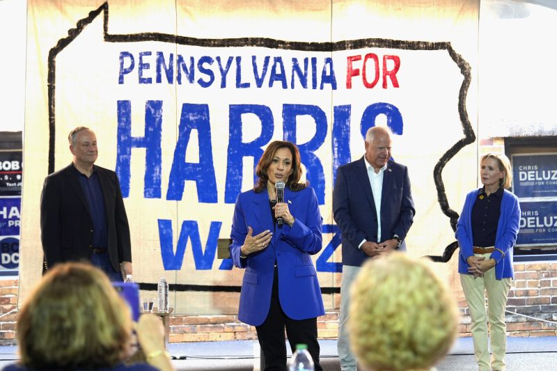 Democratic presidential nominee Vice President Kamala Harris speaks as second gentleman Doug Emhoff, from left, Democratic vice presidential nominee Minnesota Gov. Tim Walz and his wife Gwen Walz listen at a campaign event, Aug. 18, in Rochester, Pa.