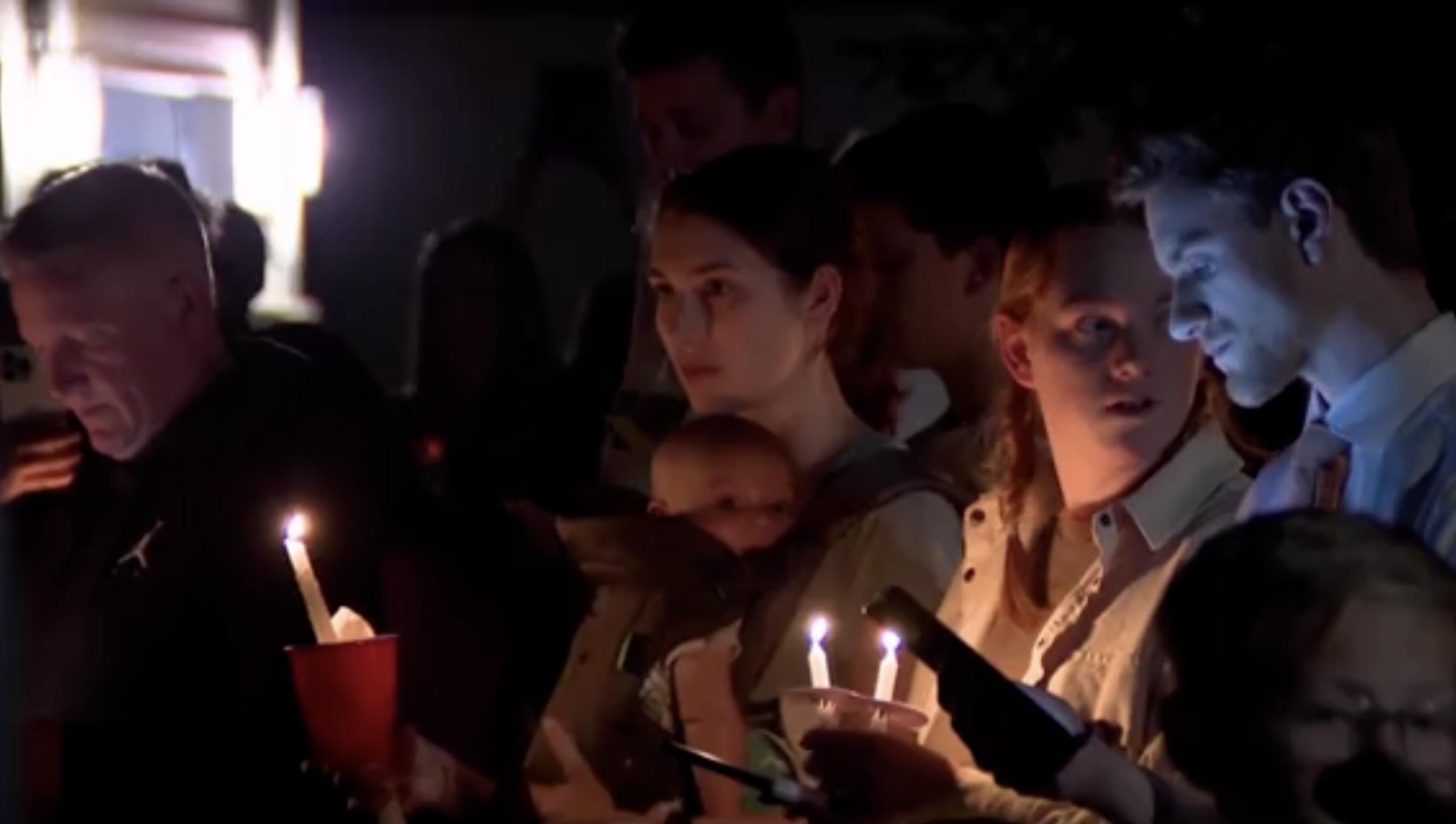 Close relatives and neighbors of a family who died in a tragic murder-suicide mourned together and remembered their lives at a vigil in West Haven Sunday night.