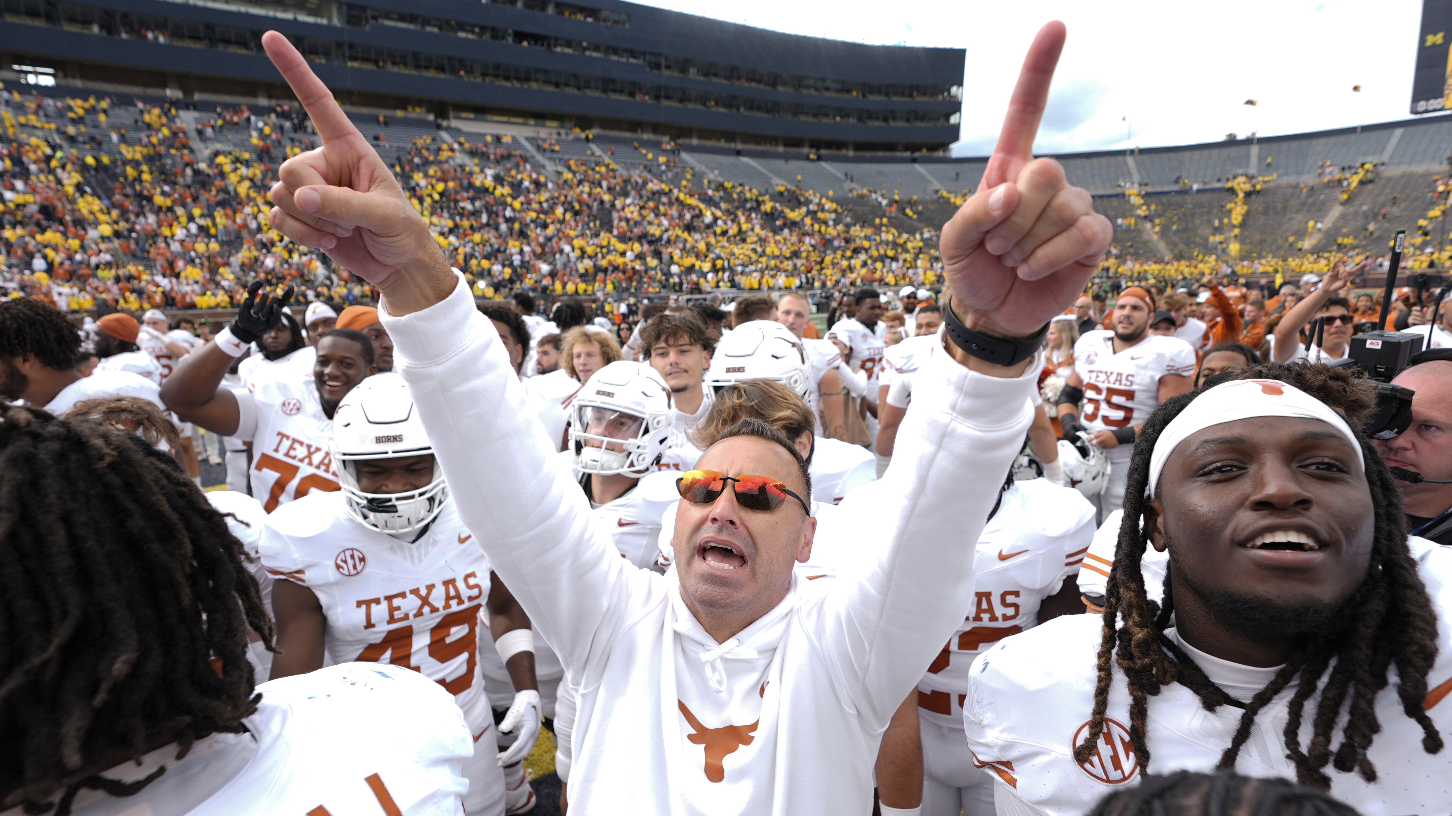 Texas head coach Steve Sarkisian celebrates after in beating Michigan 31-12 in an NCAA college football game in Ann Arbor, Mich., Saturday, Sept. 7, 2024.