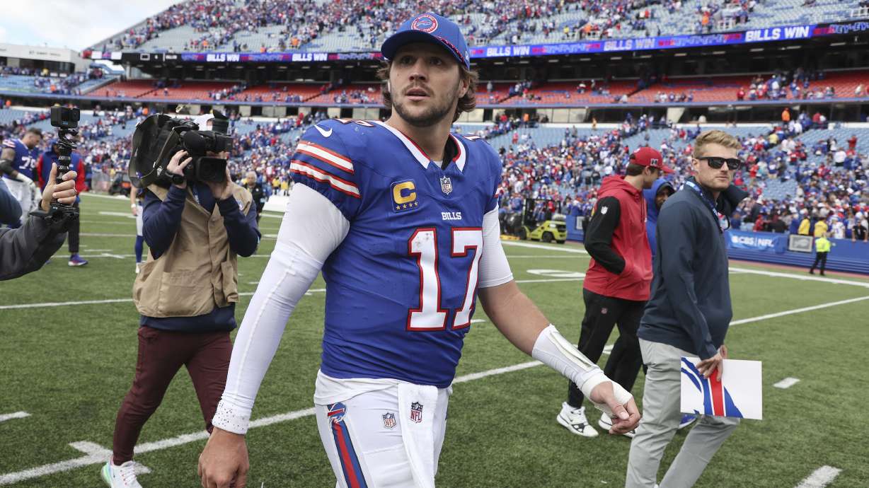 Buffalo Bills quarterback Josh Allen walks off the field after an NFL football game against the Arizona Cardinals Sunday, Sept. 8, 2024, in Orchard Park, N.Y. The Bills won 34-28.