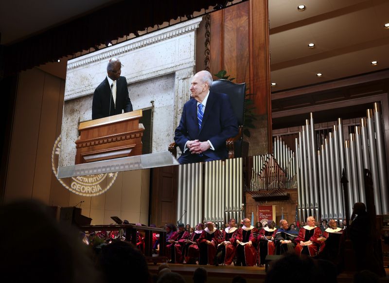 Dr. Lawrence Edward Carter Sr., professor and founding dean of the Martin Luther King, Jr. International Chapel, honors President Russell M. Nelson with the Gandi-King-Mandela Peace Prize at the annual Worldhouse Interfaith & Interdenominational Assembly at the Martin Luther King Jr. International Chapel at Morehouse College in Atlanta on April 13, 2023.