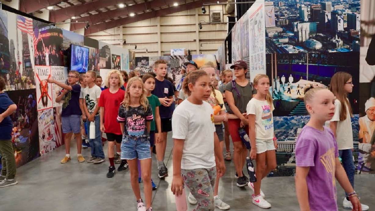 Kids tour The 9/11 Project exhibition on the Sept. 11, 2001, terrorist attacks during its stop in 2022 in Farmington.