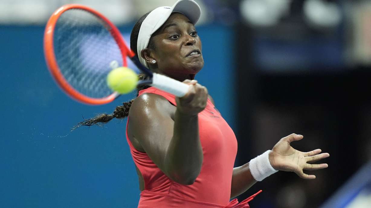 Sloane Stephens, of the United States, returns a shot to Clara Burel, of France, during a first round match of the U.S. Open tennis championships, Monday, Aug. 26, 2024, in New York.