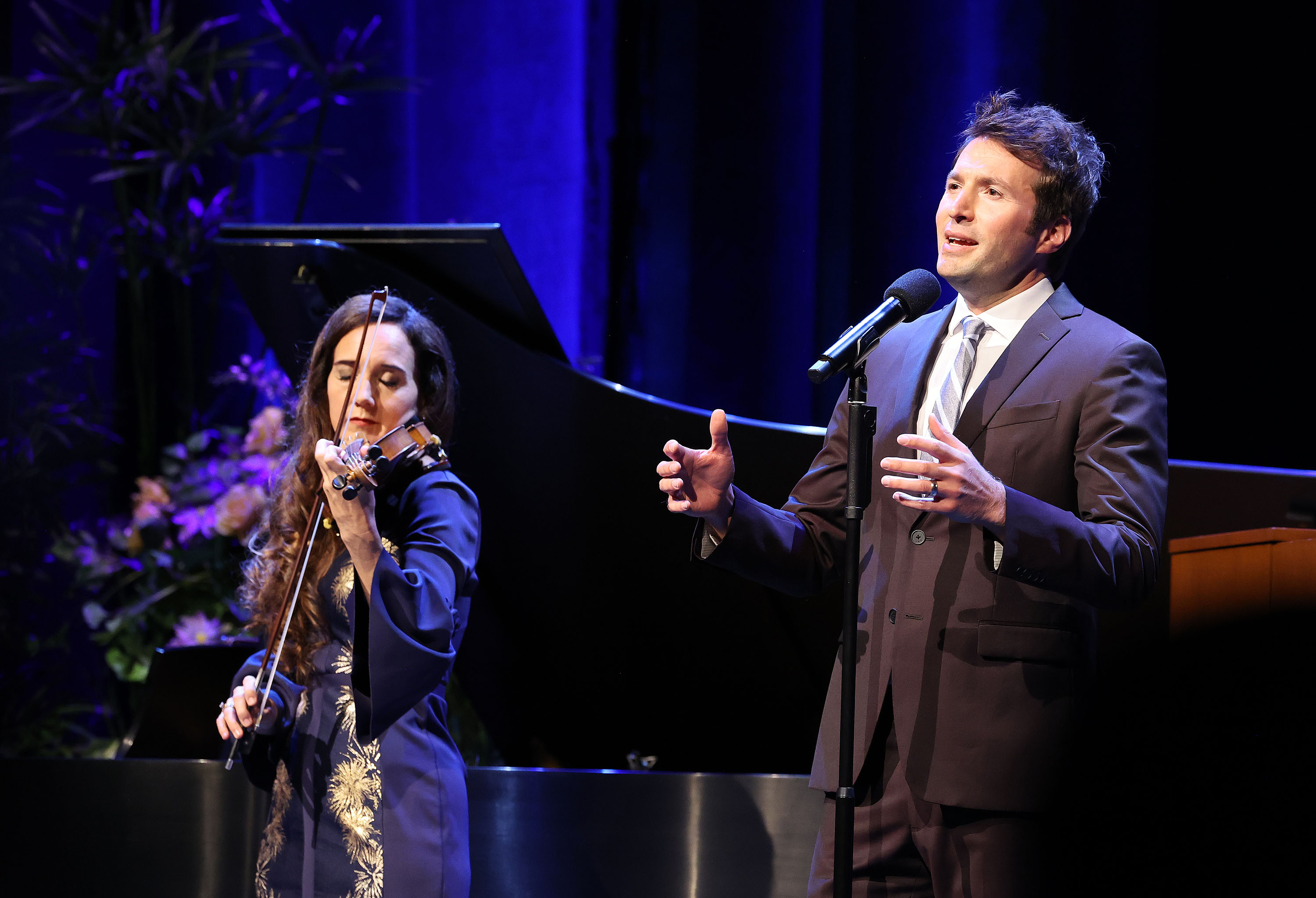Nathan Pacheco and Jenny Oaks Baker perform for President Russell M. Nelson’s 100th birthday celebration at the Little Theatre of the Conference Center in Salt Lake City on Monday.