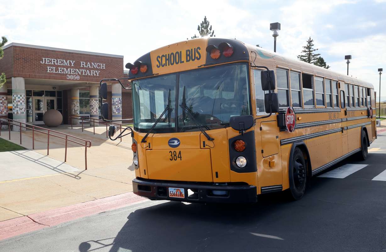 An electric school bus is pictured outside of Jeremy Ranch Elementary School in Park City on Tuesday. Park City, Granite and Uintah school districts will each get two new electric buses with funding from $1.49 million in rebates, as part of the Biden administration’s Investing in America agenda.