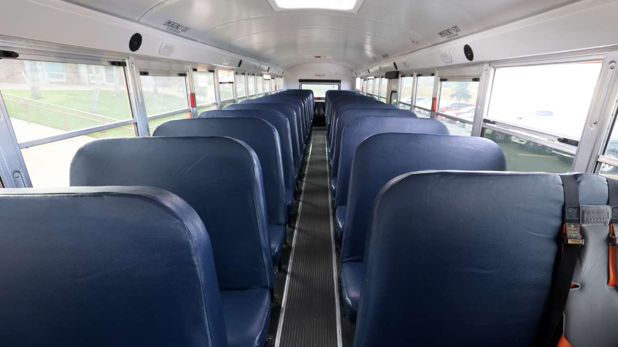 Interior of a school bus (File photo). A bus driver for the Jordan School District, who has since been fired, is accused of secretly recording a young girl on his bus while driving.
