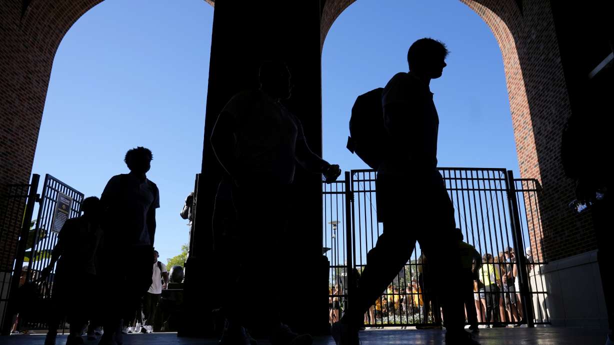 Iowa players arrive at Kinnick Stadium before an NCAA college football game against Illinois State, Saturday, Aug. 31, 2024, in Iowa City, Iowa.