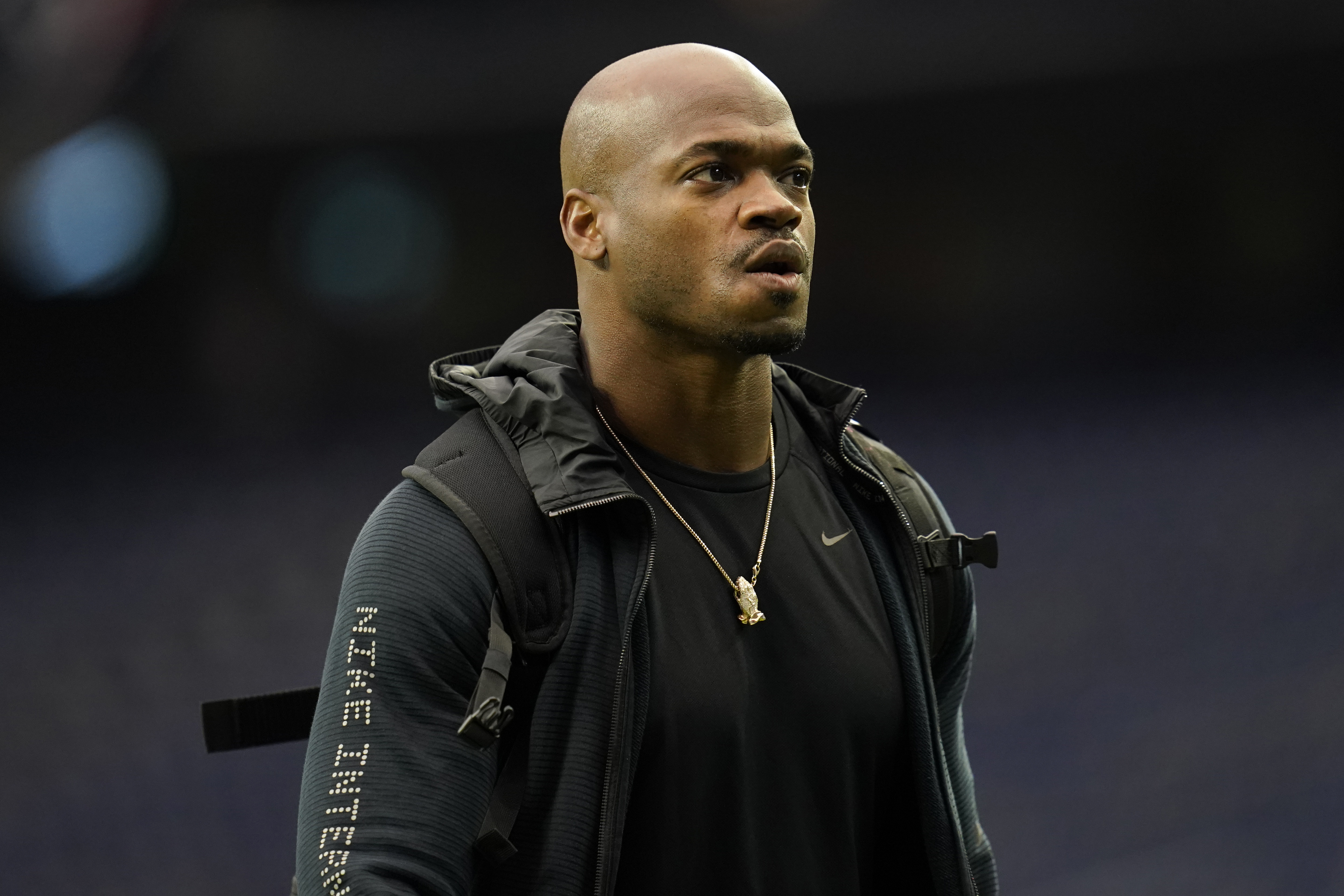 FILE - Seattle Seahawks running back Adrian Peterson looks on during player arrivals before an NFL football game against the Houston Texans, Dec. 12, 2021, in Houston.