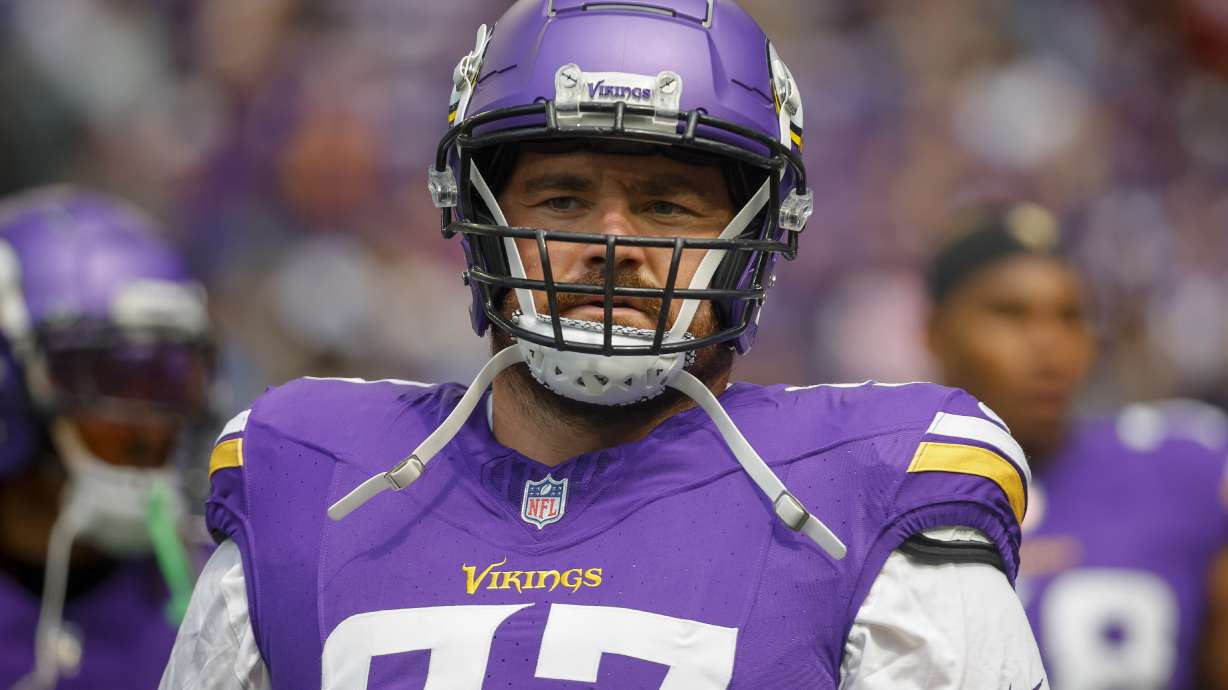 FILE - Minnesota Vikings defensive tackle Harrison Phillips (97) prepares to play the Las Vegas Raiders before an NFL preseason football game, Aug. 10, 2024, in Minneapolis.