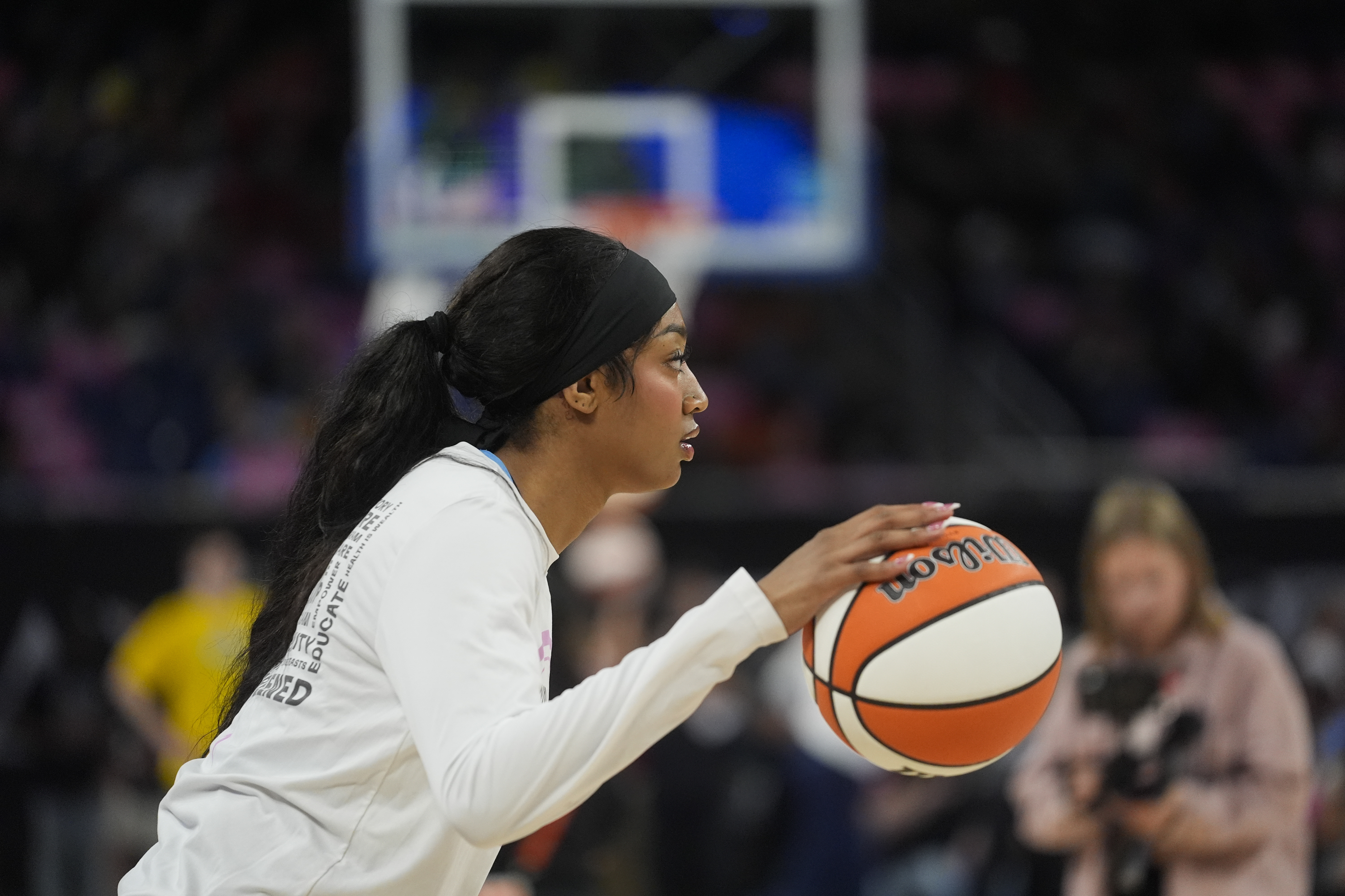 Chicago Sky's Angel Reese warms up before a WNBA basketball game against the Indiana Fever, Friday, Aug. 30, 2024, in Chicago.