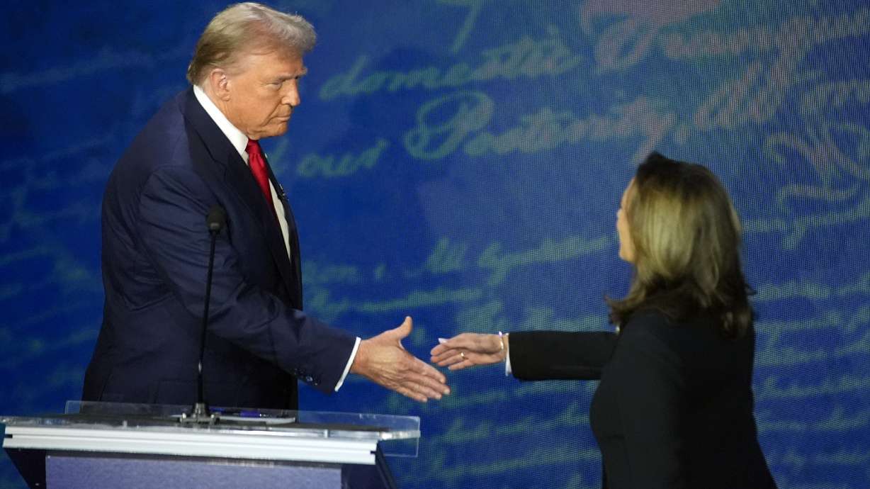 Republican presidential nominee former President Donald Trump shakes hands with Democratic presidential nominee Vice President Kamala Harris during an ABC News debate at the National Constitution Center in Philadelphia Tuesday.