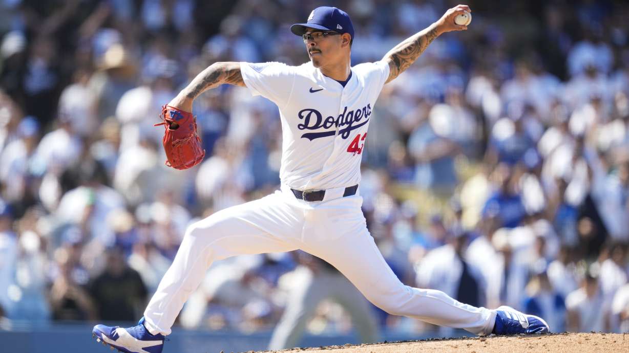Los Angeles Dodgers relief pitcher Anthony Banda throws during the ninth inning of a baseball game against the Tampa Bay Rays in Los Angeles, Sunday, Aug. 25, 2024.