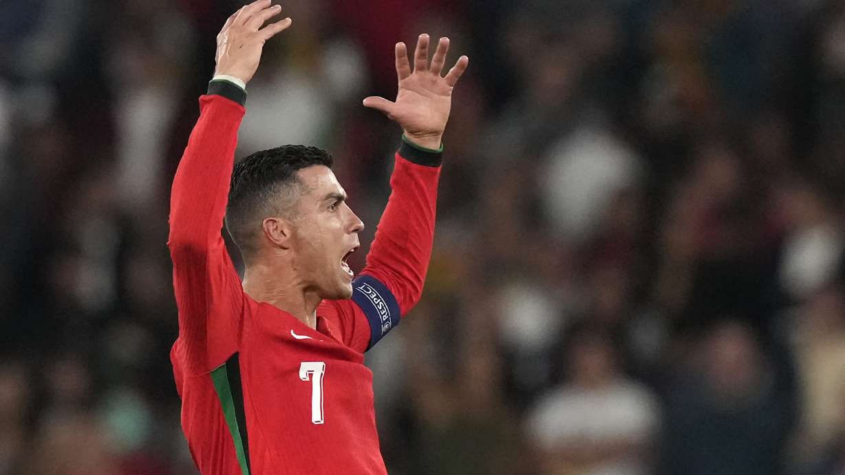 Portugal's Cristiano Ronaldo celebrates after the UEFA Nations League soccer match between Portugal and Scotland at the Luz stadium in Lisbon, Portugal, Sunday, Sept. 8, 2024.
