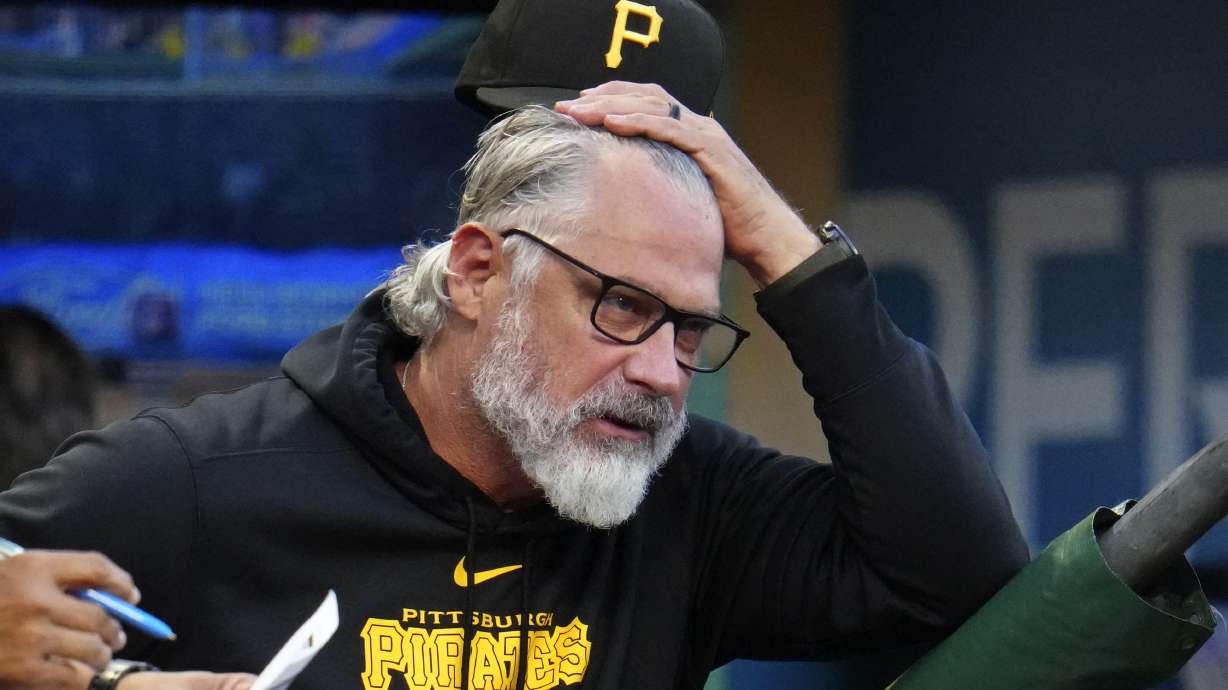 Pittsburgh Pirates manager Derek Shelton reacts in the dugout during the first inning of a baseball game against the Washington Nationals in Pittsburgh, Thursday, Sept. 5, 2024.