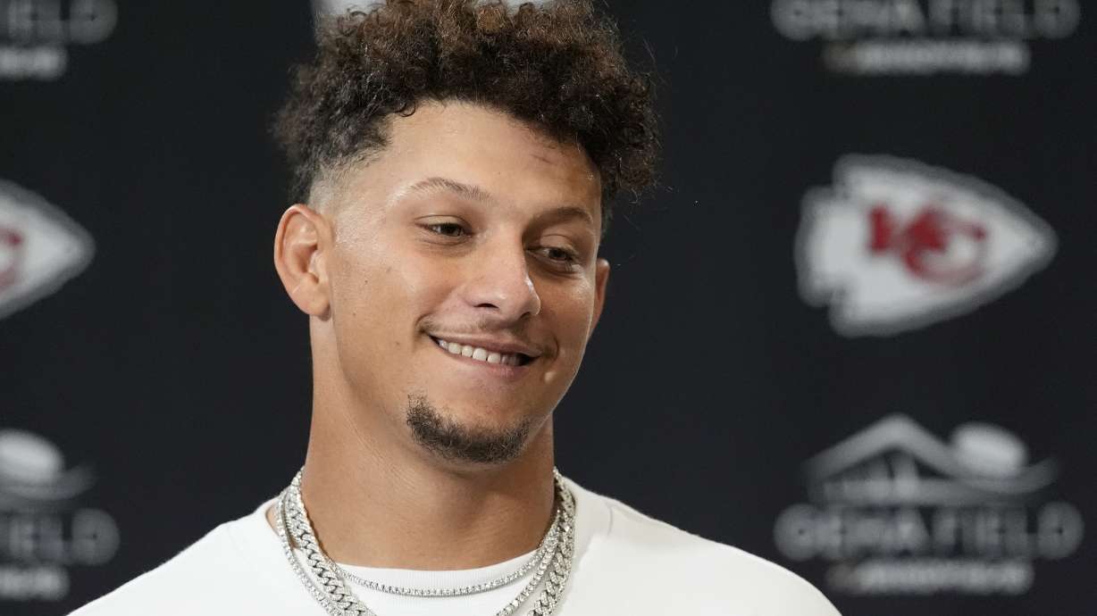 Kansas City Chiefs quarterback Patrick Mahomes smiles during a news conference following an NFL football game against the Baltimore Ravens Thursday, Sept. 5, 2024, in Kansas City, Mo. The Chiefs won 27-20.