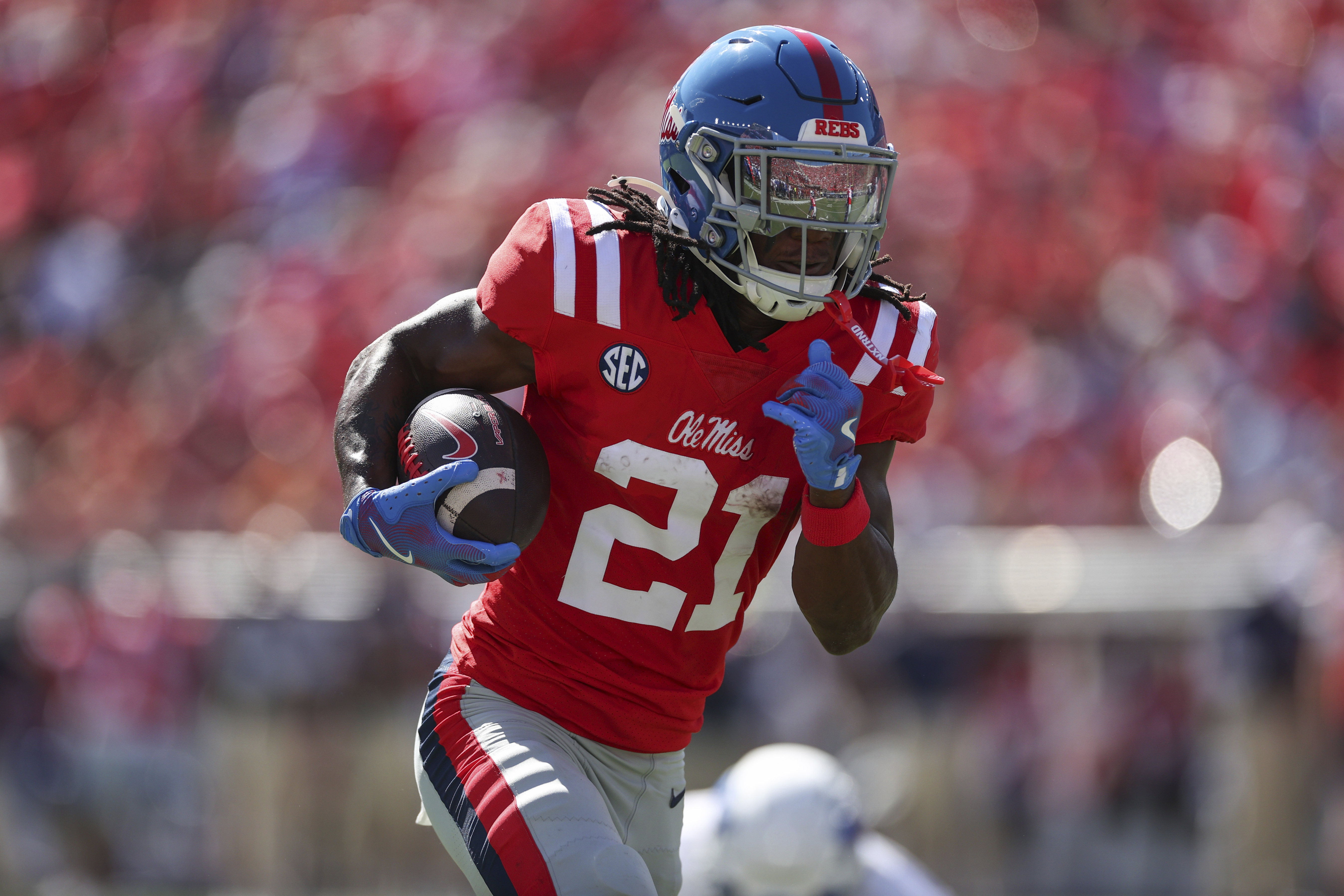 Mississippi running back Henry Parrish Jr. (21) runs the ball during the first half of an NCAA college football game against Middle Tennessee, Saturday, Sept. 7, 2024, in Oxford, Miss.