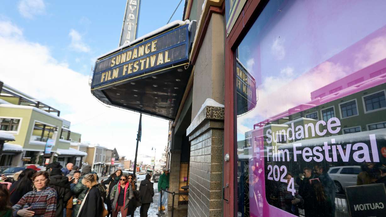People gather outside the Egyptian Theatre during the 2024 Sundance Film Festival on Main Street in Park City on Jan. 18. The festival has narrowed its future site to three options, including Park City/Salt Lake City.