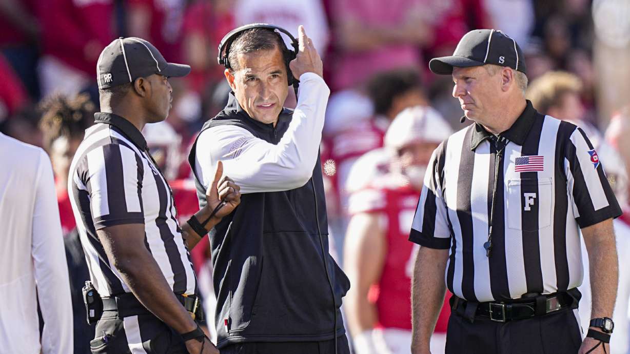 Wisconsin coach Luke Fickell talks with officials during the second half of an NCAA college football game against South Dakota, Saturday, Sept. 7, 2024, in Madison, Wis.