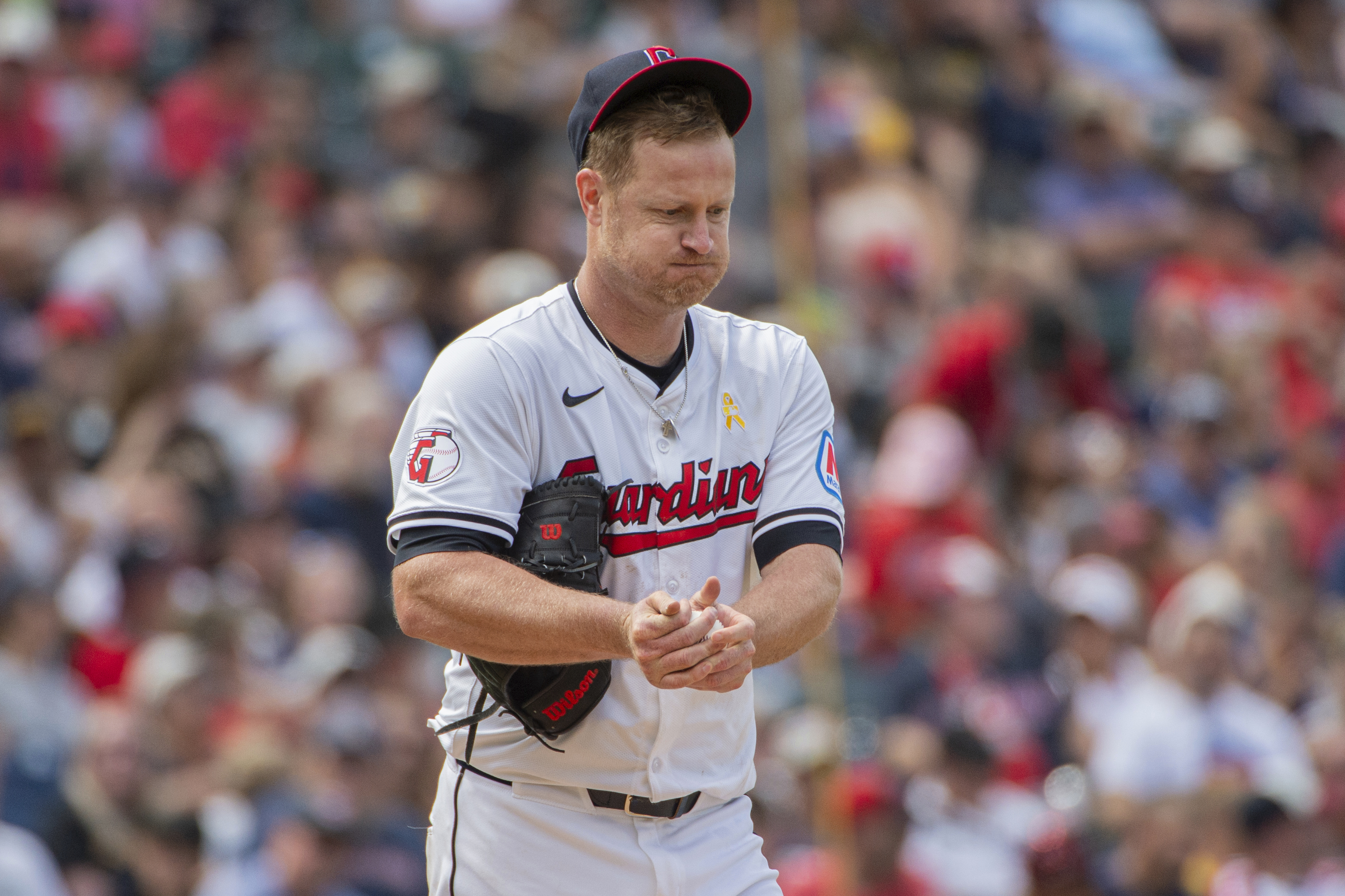 Cleveland Guardians starter Alex Cobb reacts between pitches during the seventh inning of a baseball game against the Pittsburgh Pirates in Cleveland, Sunday, Sept. 1, 2024.
