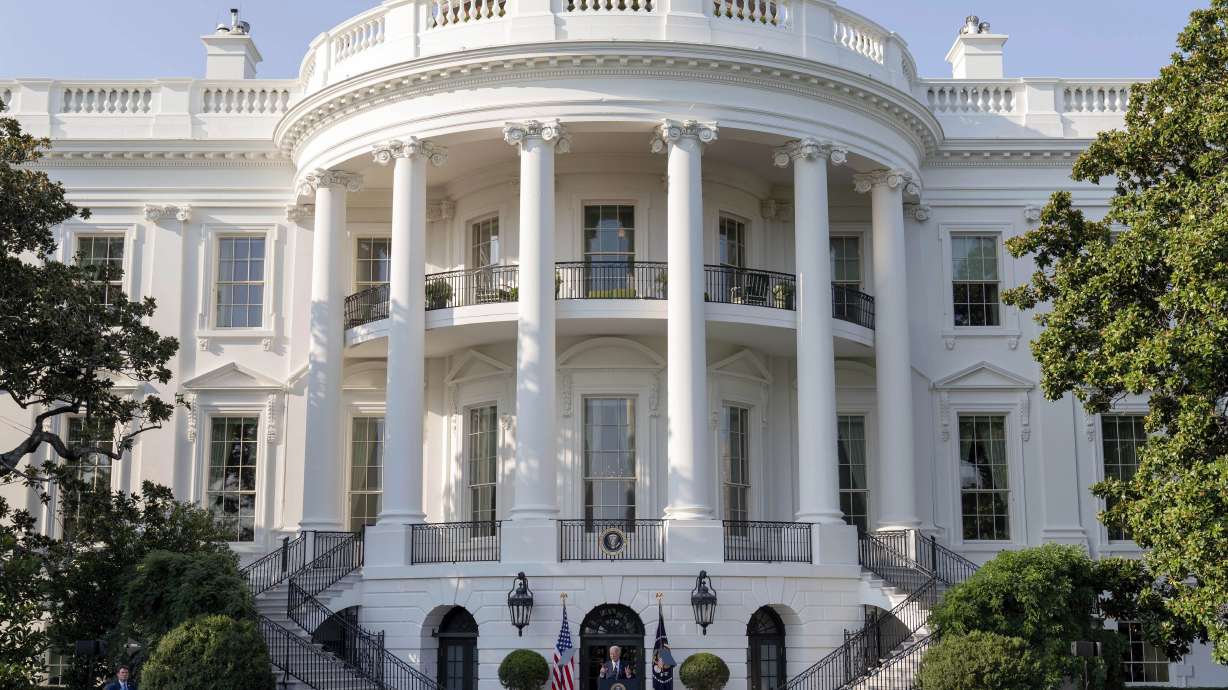 President Joe Biden speaks from the South Lawn of the White House in Washington on Monday. In a deal brokered by the Biden administration, tech companies said they would voluntarily commit to removing nude images from AI training datasets and committed to safeguards to curb the spread of harmful imagery.