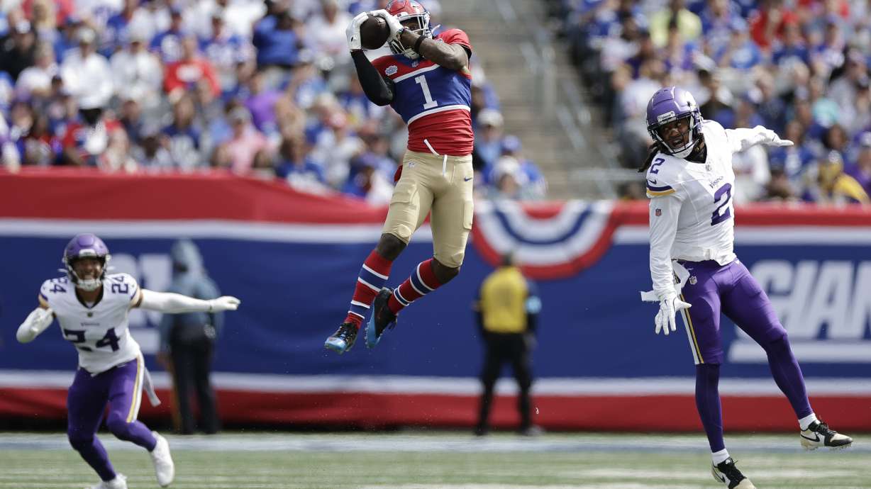 New York Giants wide receiver Malik Nabers (1) catches a pass during the second half of an NFL football game against the Minnesota Vikings, Sunday, Sept. 8, 2024, in East Rutherford, N.J.