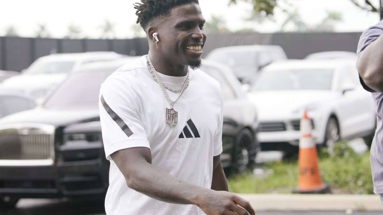 Miami Dolphins wide receiver Tyreek Hill arrives for an NFL football game against the Buffalo Bills, Thursday, Sept. 12, 2024, in Miami Gardens, Fla.