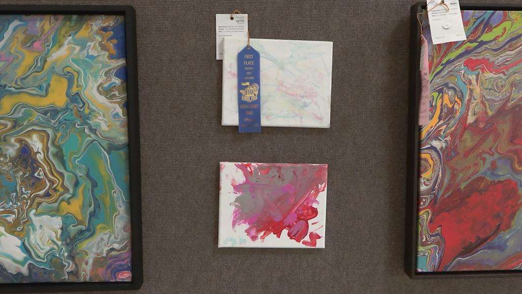 Fifteen-month-old Kinsley Muir created two paintings that have won first place at the Utah State Fair.