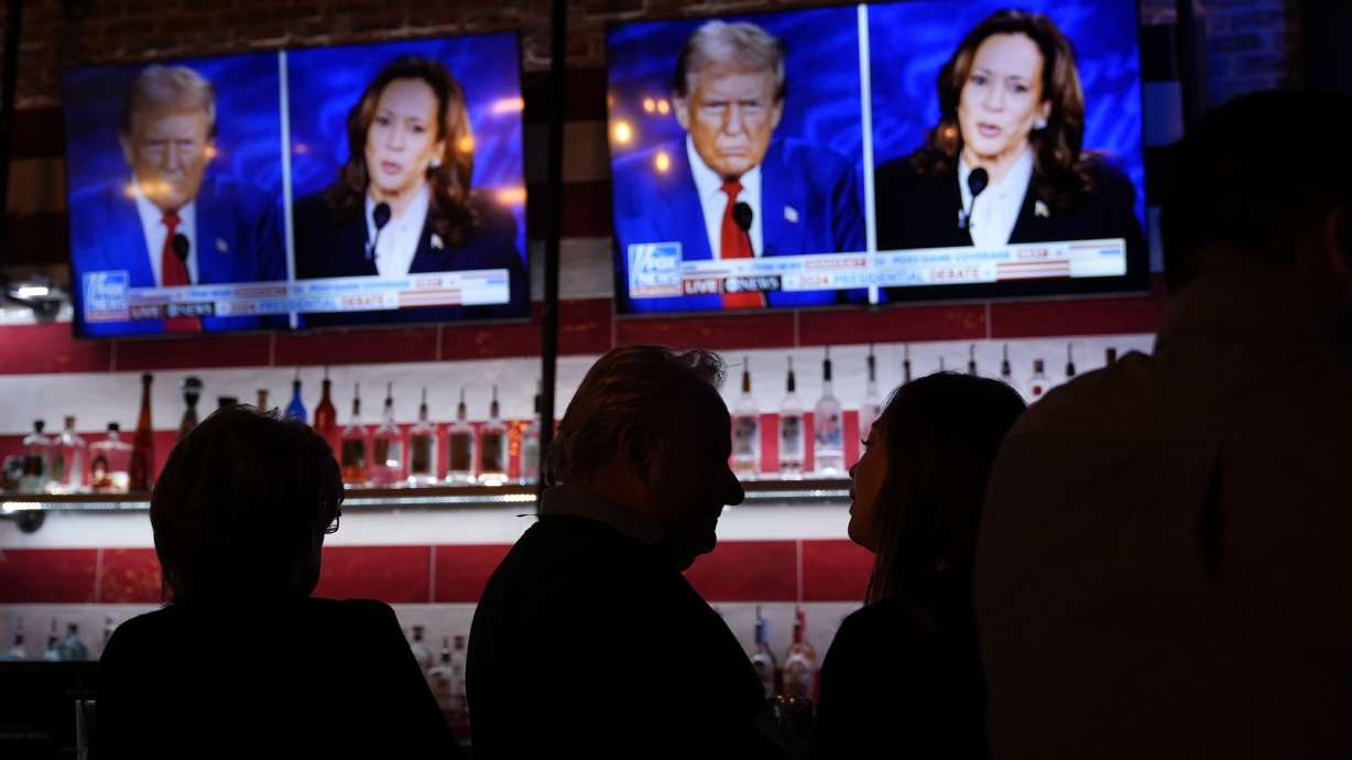 Viewers gather to watch a debate between Democratic presidential nominee Vice President Kamala Harris and Republican presidential nominee former President Donald Trump, Tuesday in San Antonio, Texas.