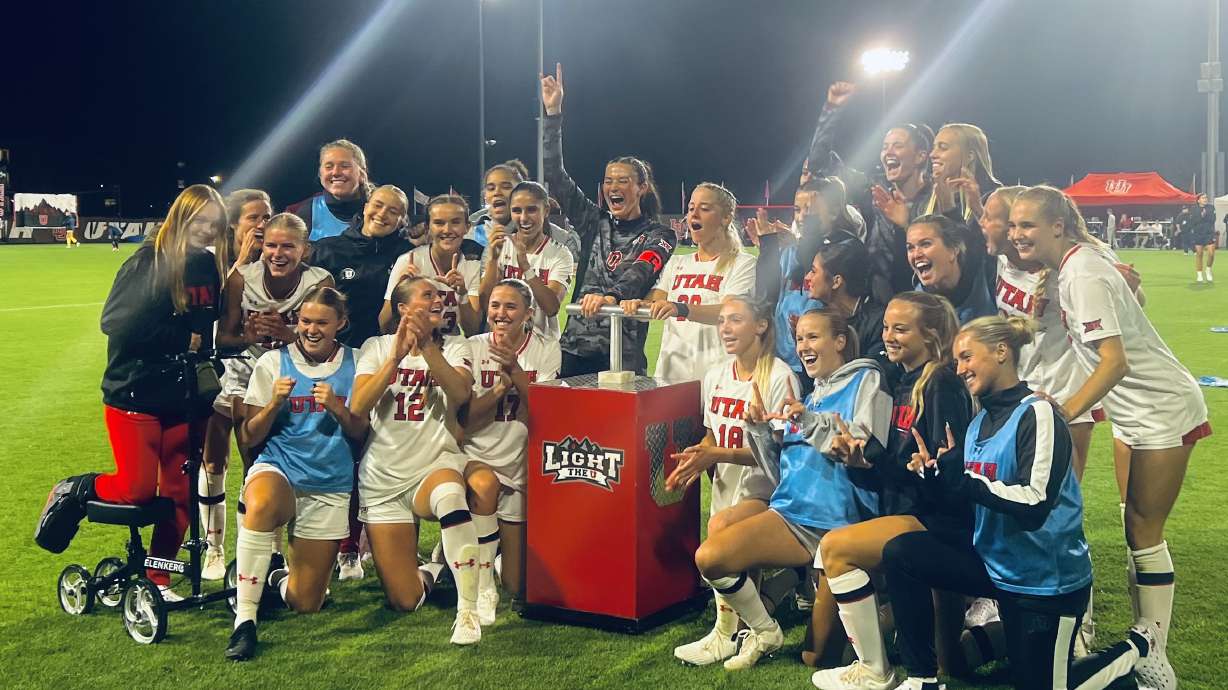 Utes celebrate together and "Light the U" after their big win.
